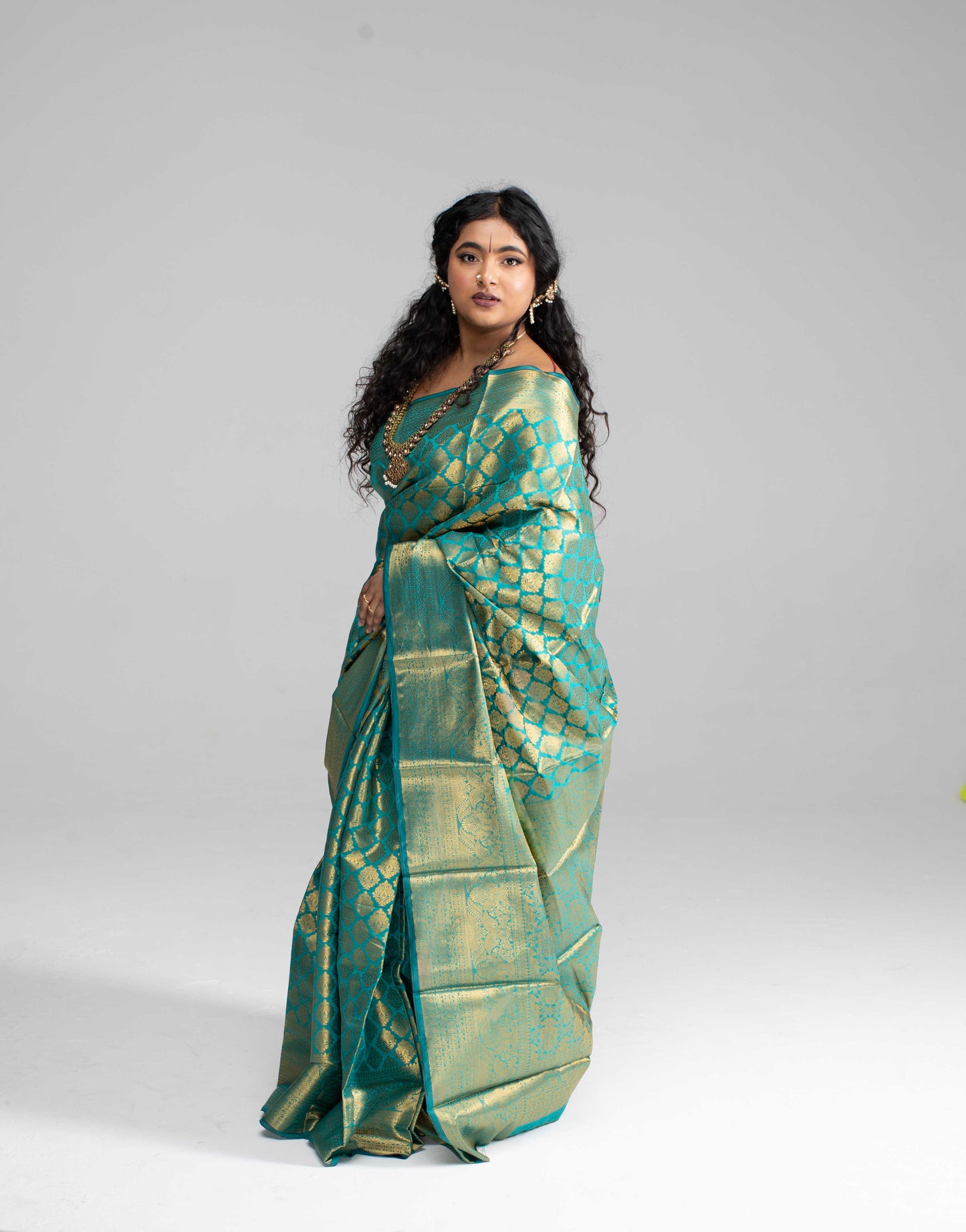 Green and gold silk saree