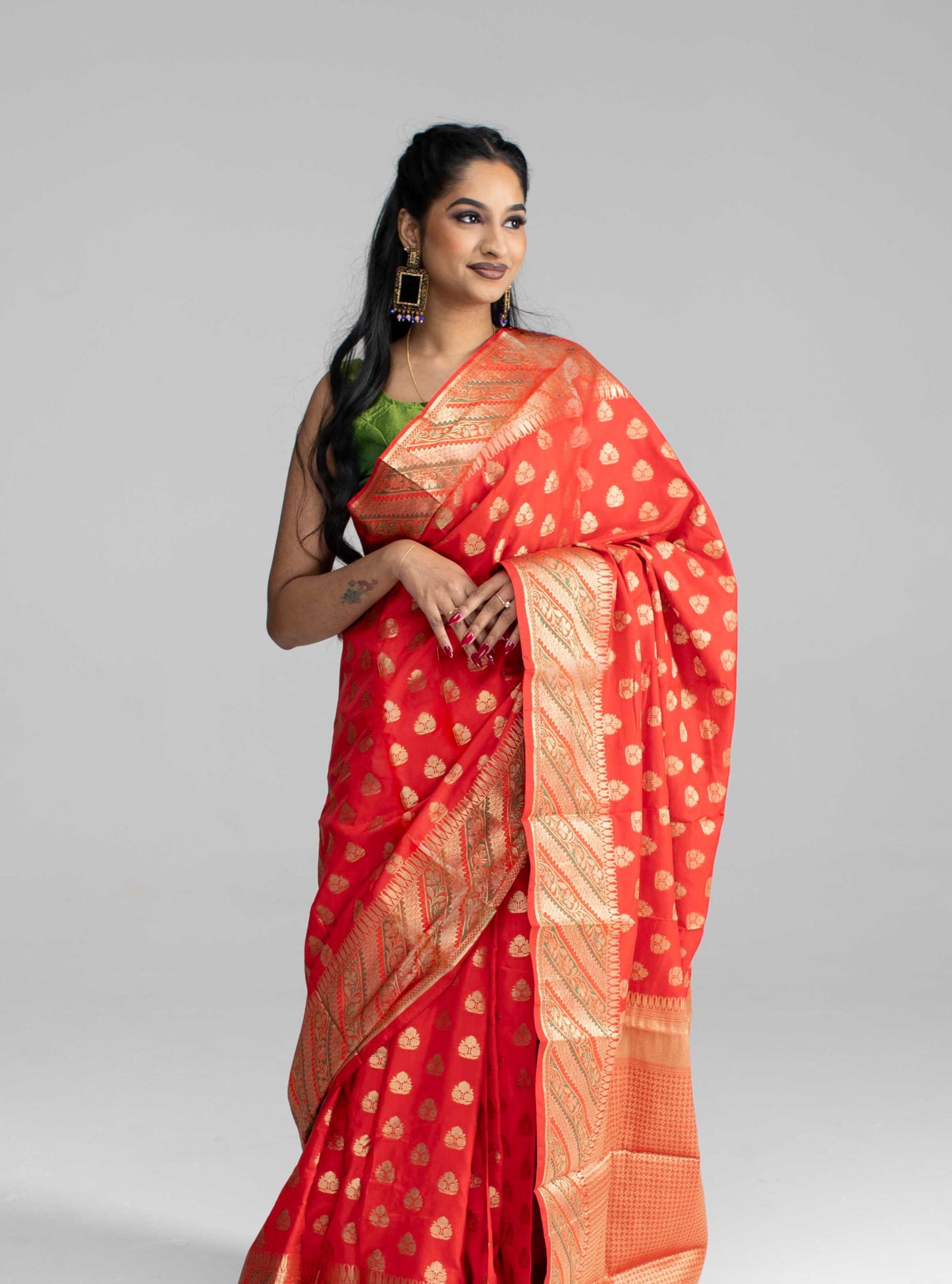Red silk saree with striped border