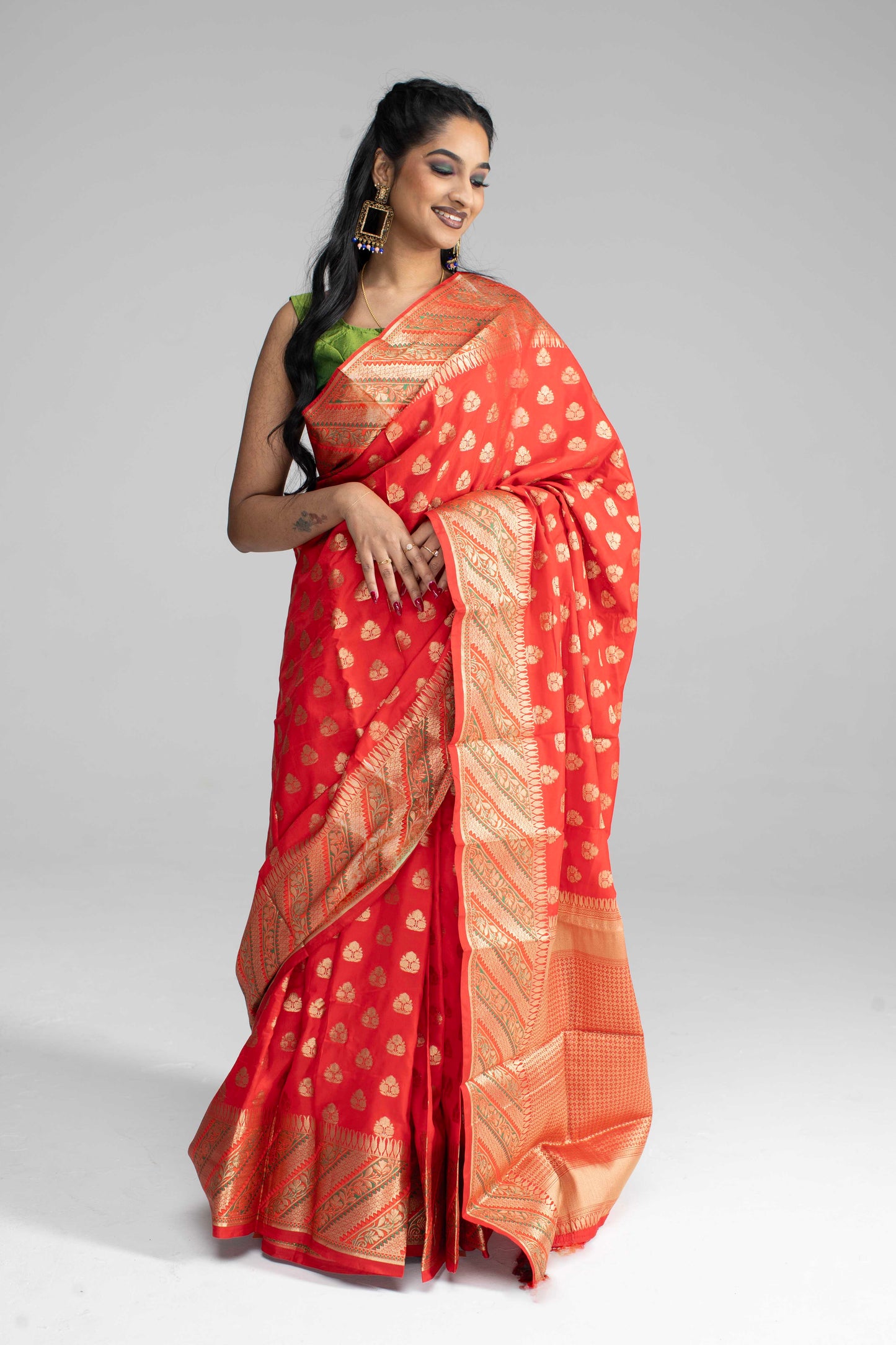 Red silk saree with striped border