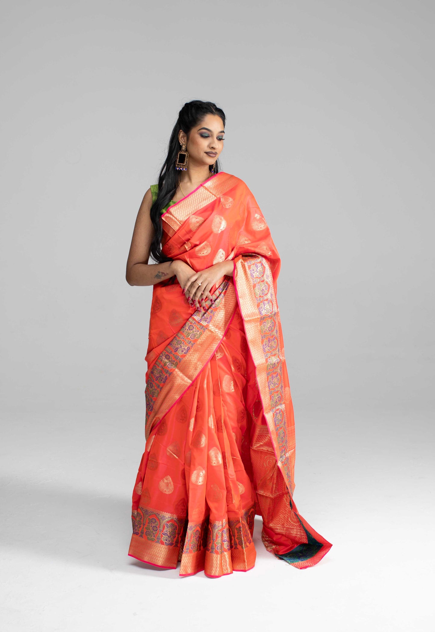 Peach silk saree with rich border