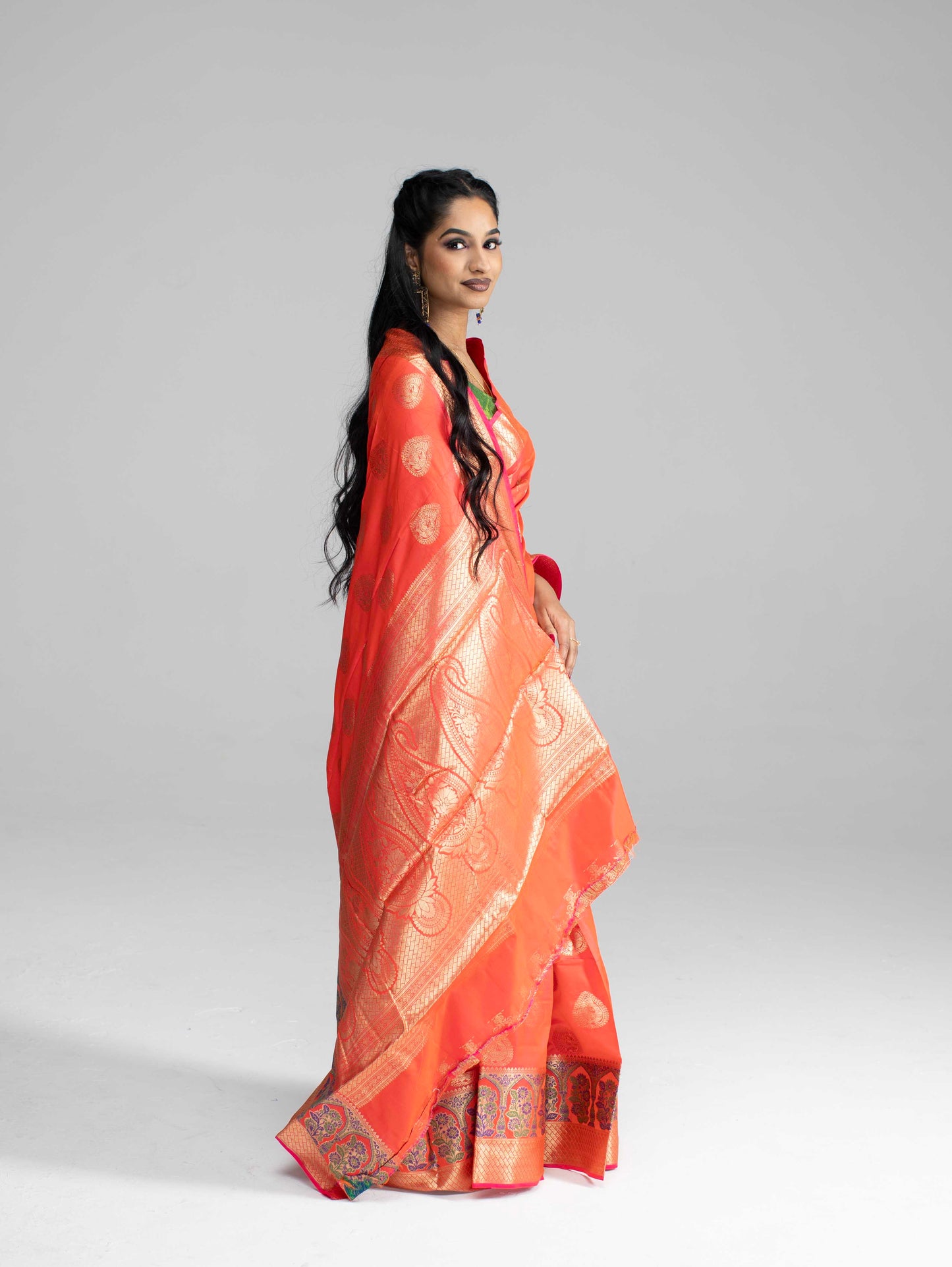 Peach silk saree with rich border