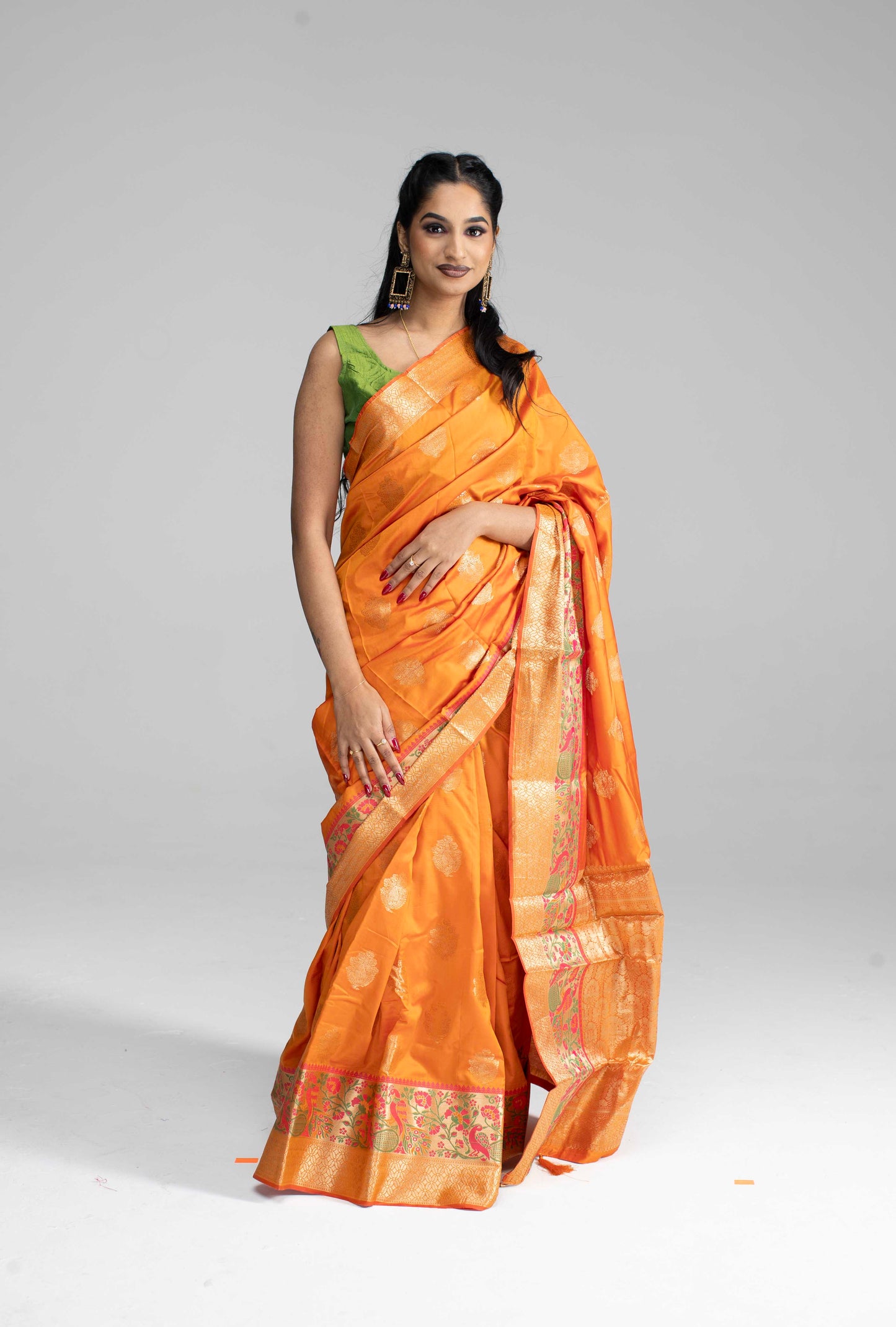 Vibrant orange silk saree with double border