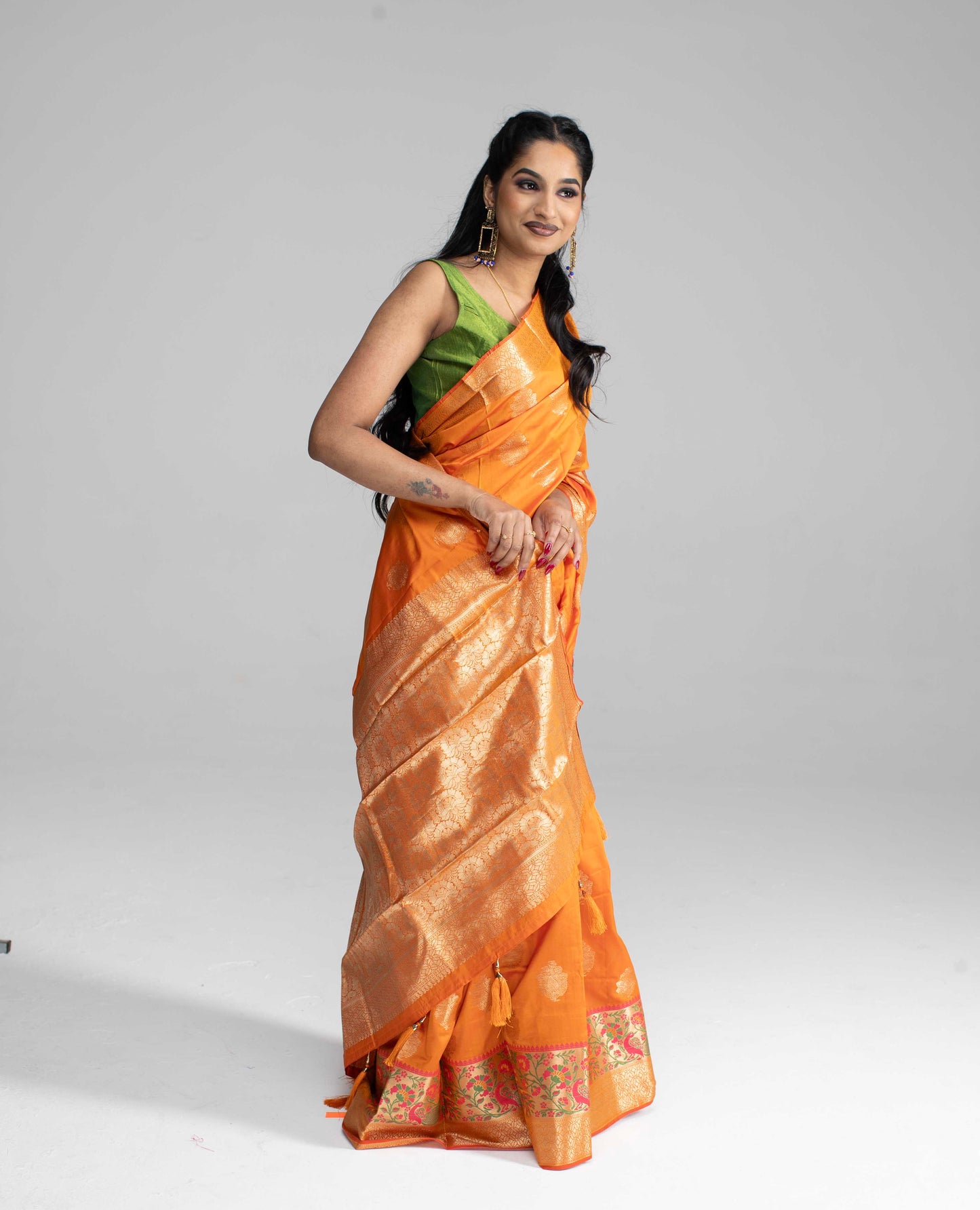 Vibrant orange silk saree with double border