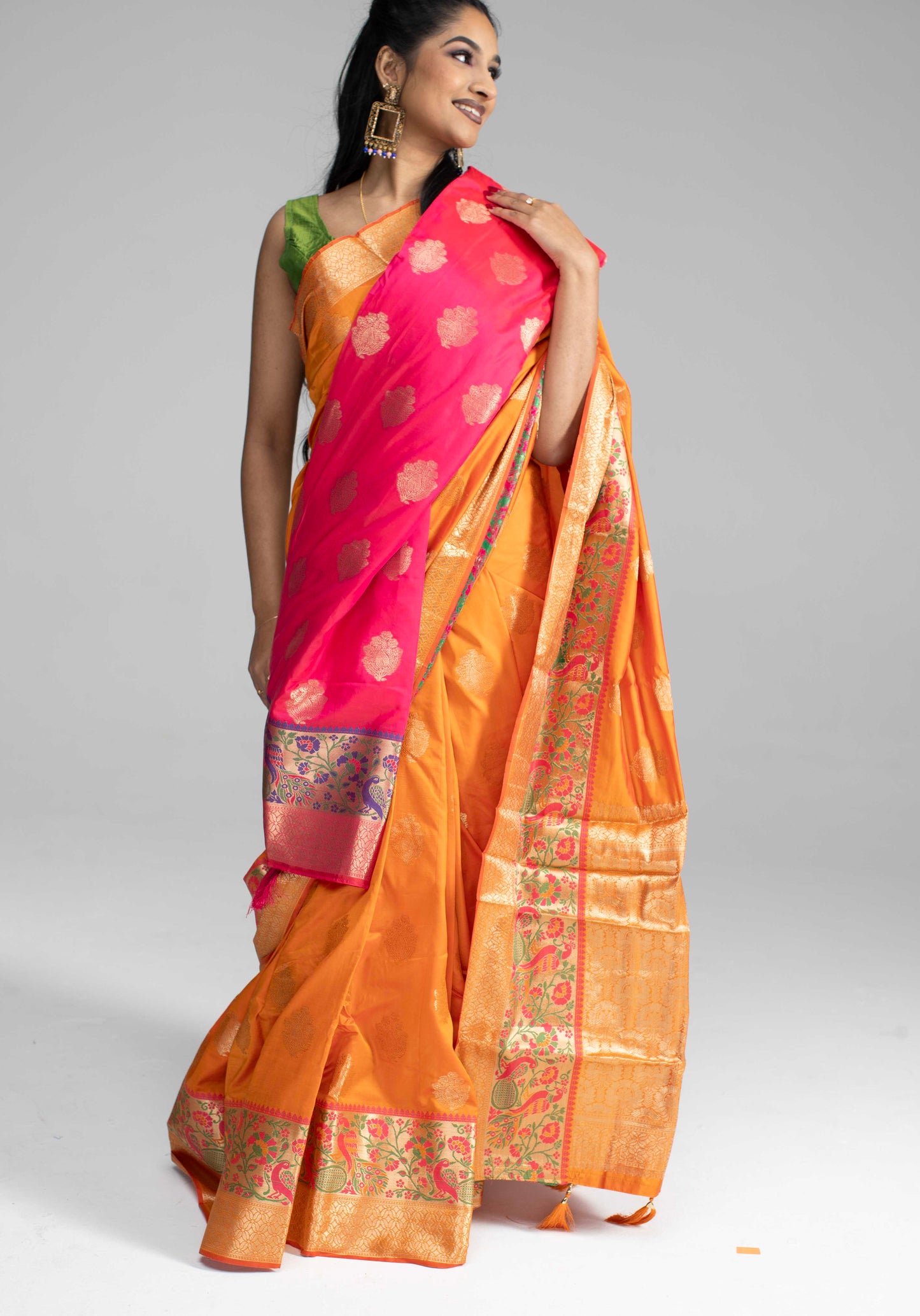 Vibrant orange silk saree with double border
