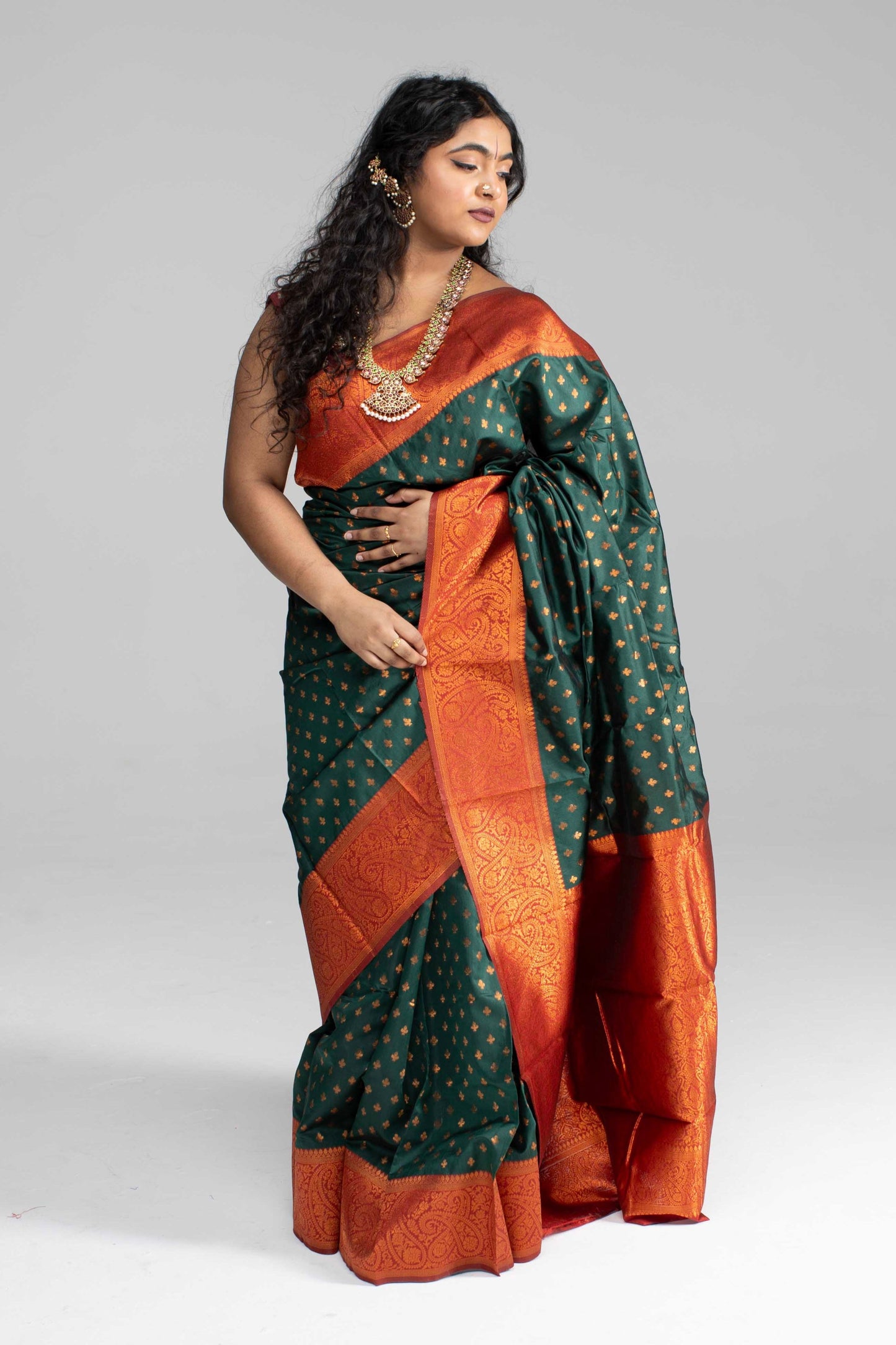 Traditional Dark Green Saree with Rich Border