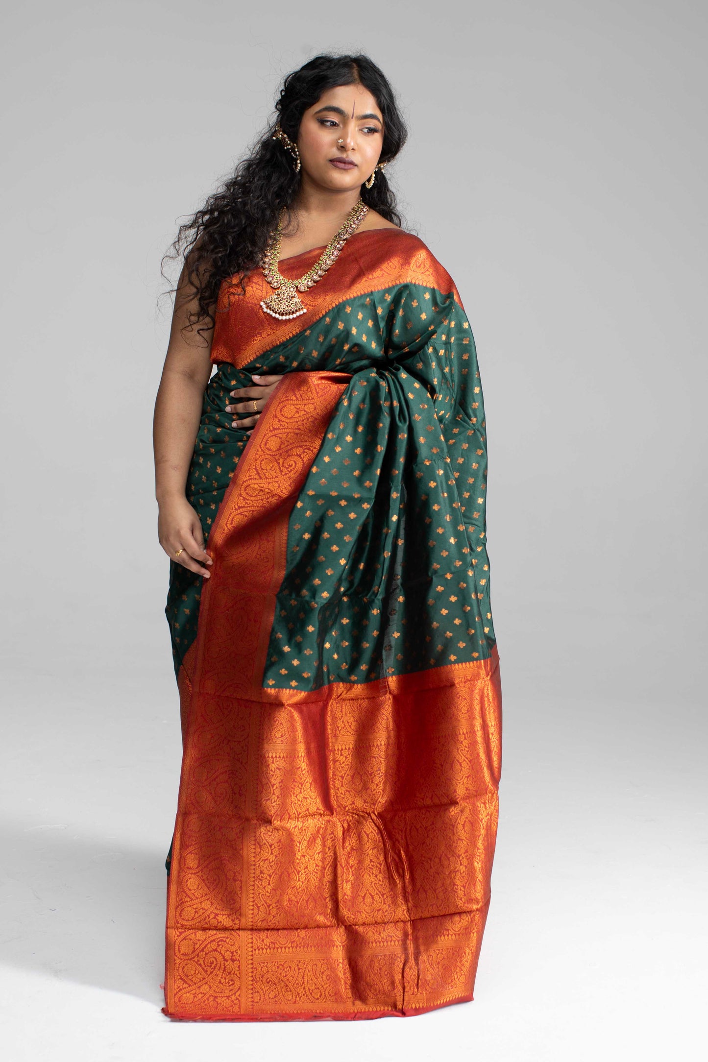 Traditional Dark Green Saree with Rich Border