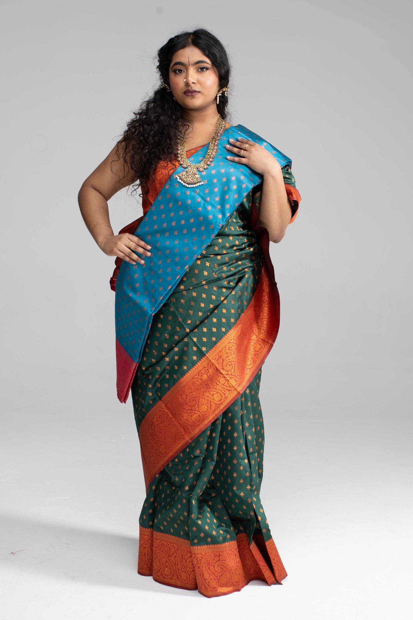 Traditional Dark Green Saree with Rich Border