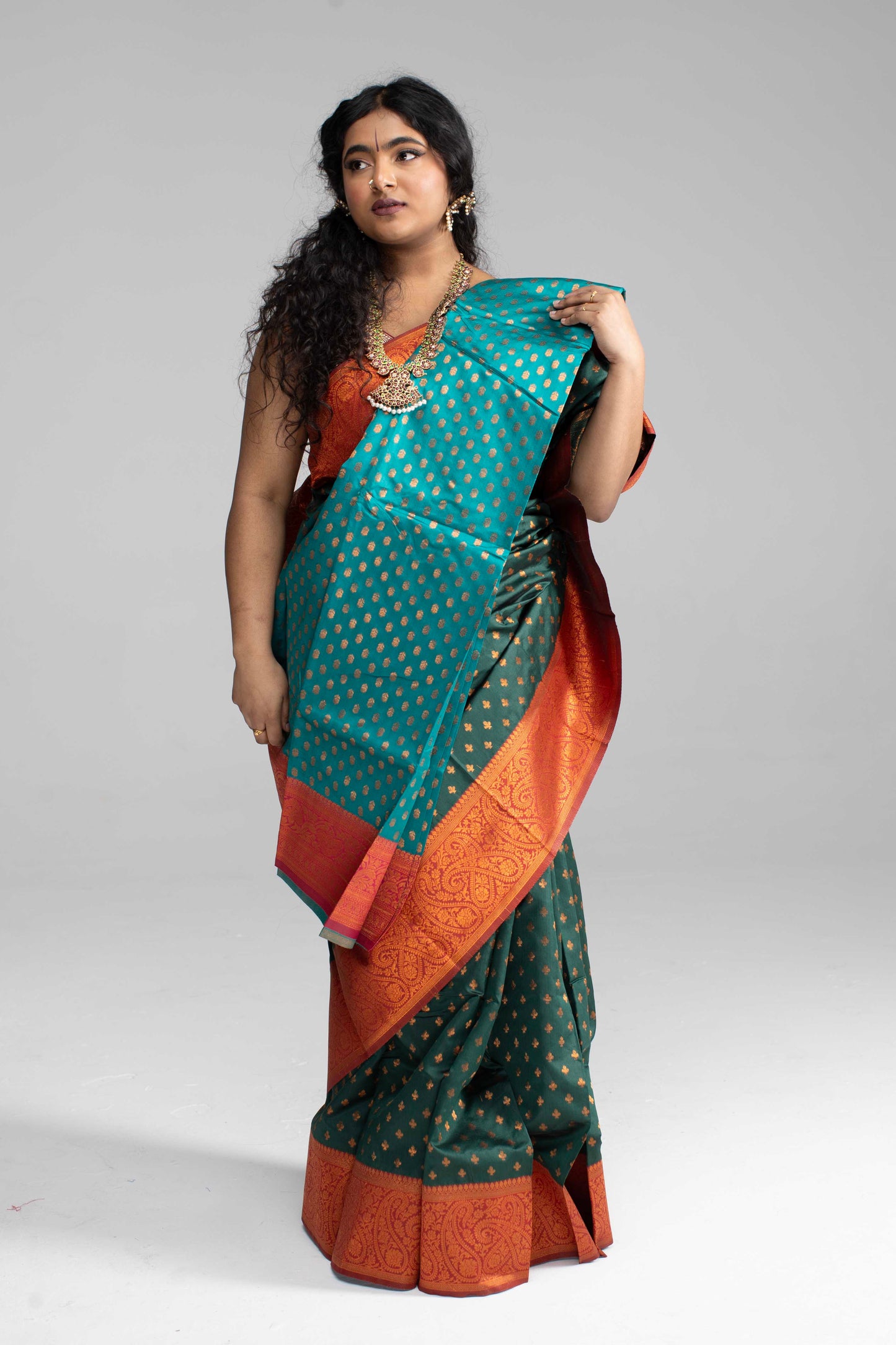 Traditional Dark Green Saree with Rich Border