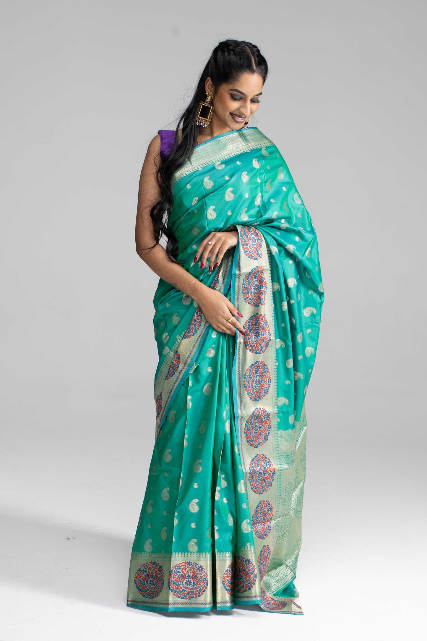 Teal Green Silk Saree with Peacock Motif Border