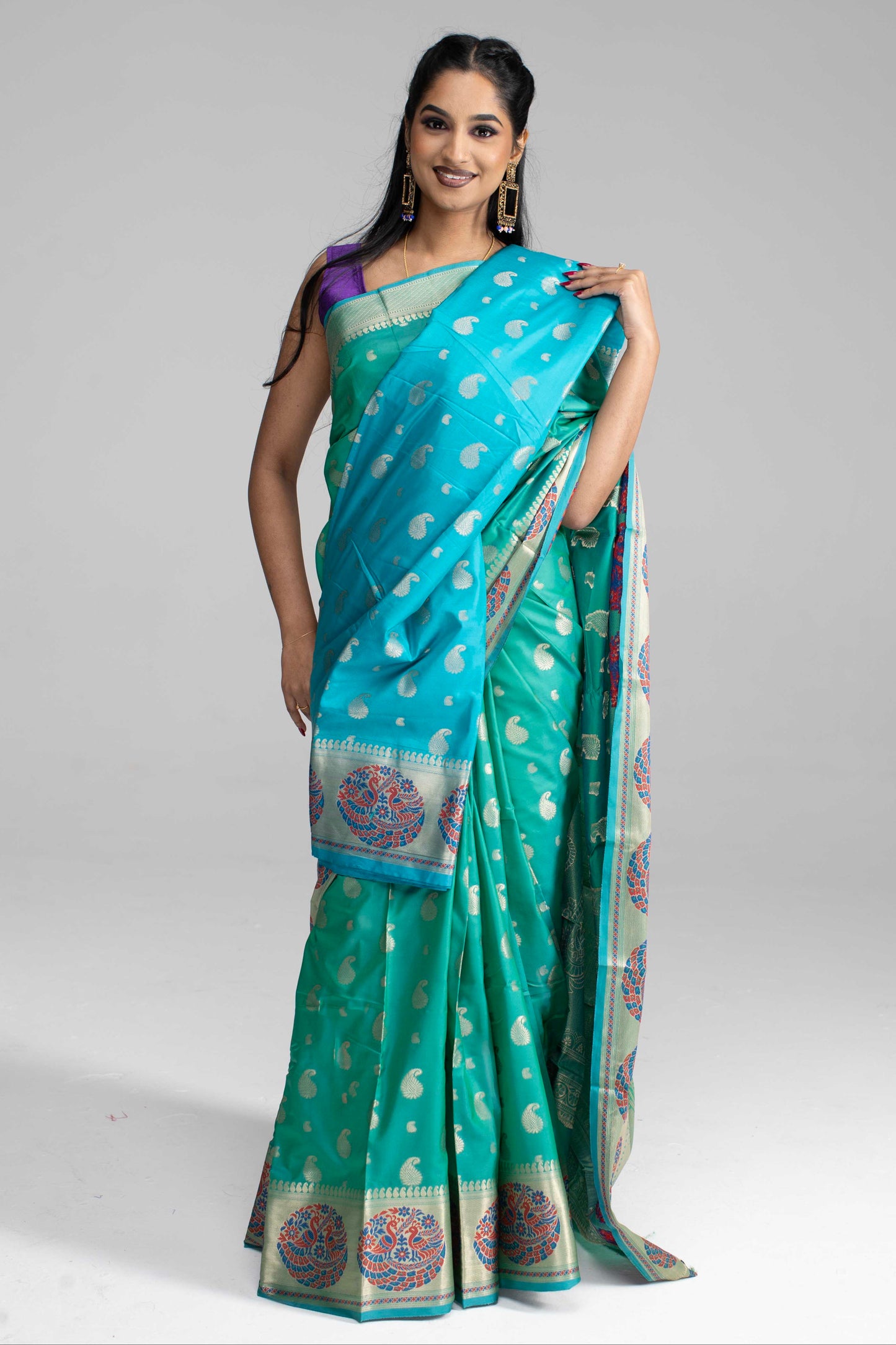 Teal Green Silk Saree with Peacock Motif Border