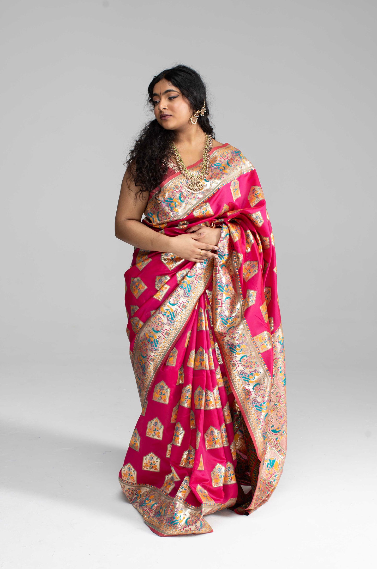 Paithani-Style Magentha Banaris Saree with Godess motifs