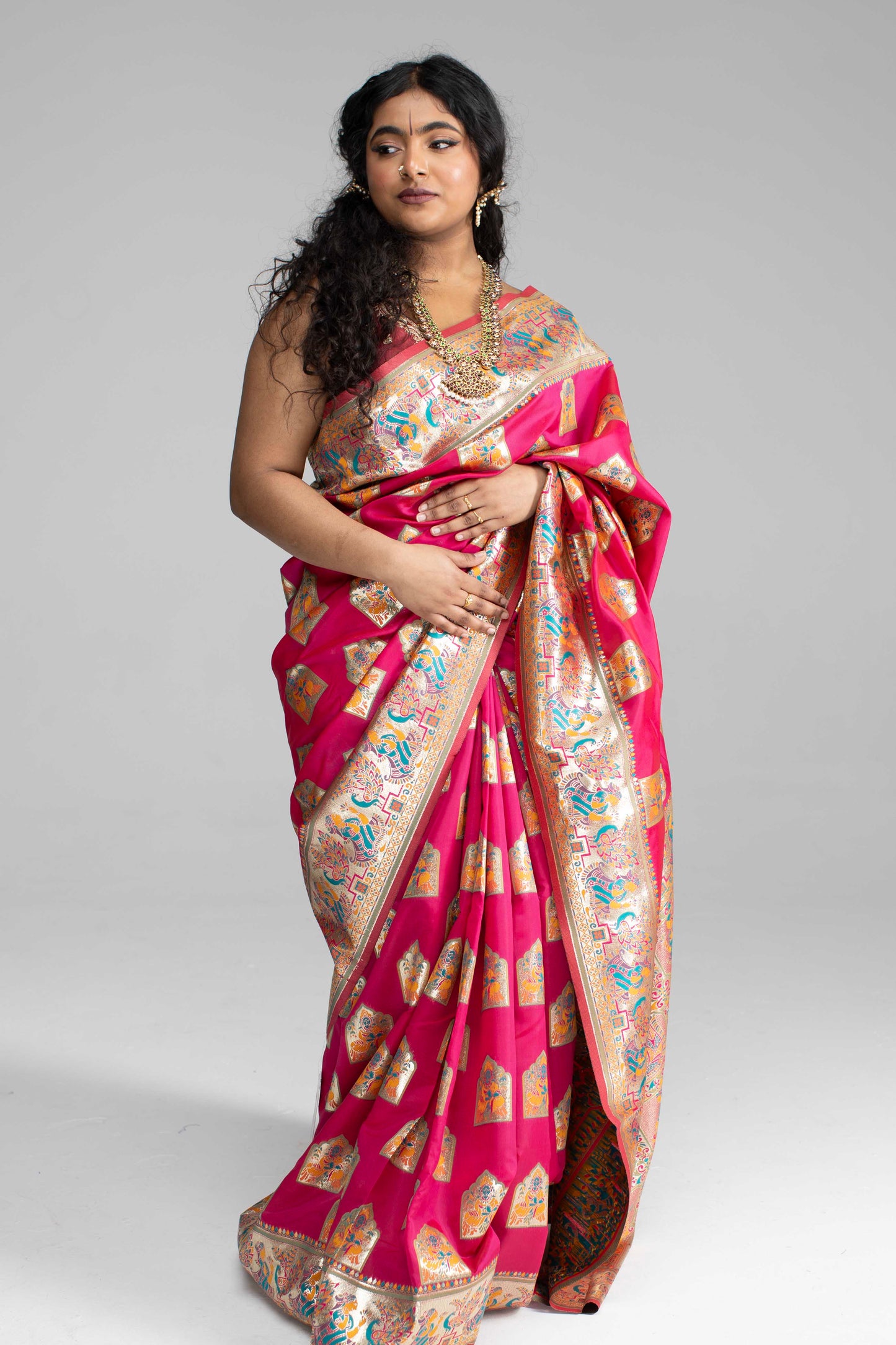 Paithani-Style Magentha Banaris Saree with Godess motifs