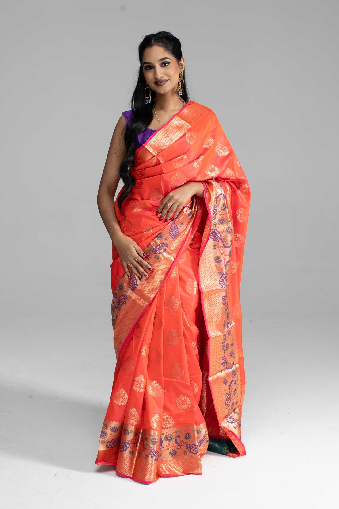 Dual-Shade Peach Saree with Broad Zari Border & Purple Peacock Motif