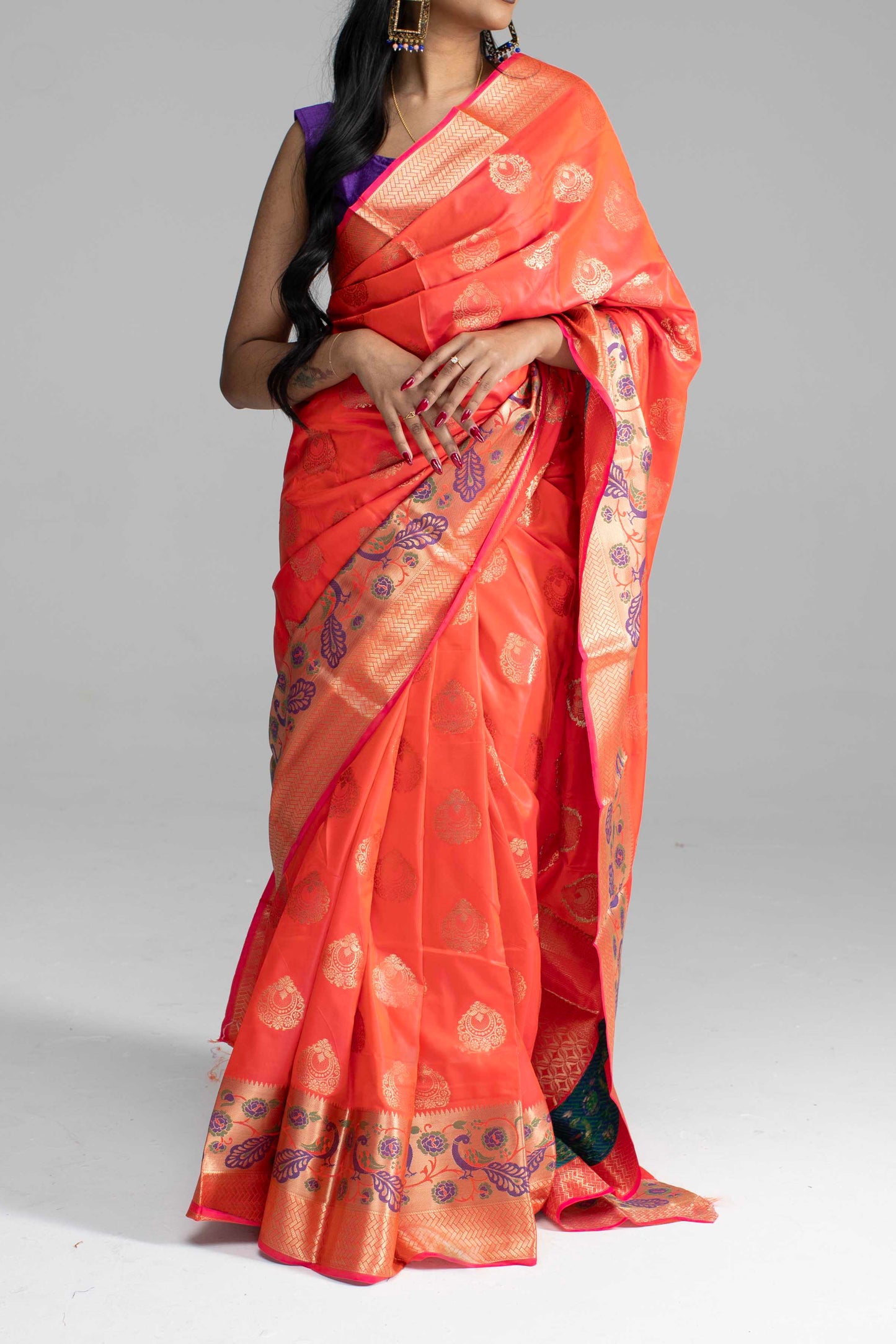 Dual-Shade Peach Saree with Broad Zari Border & Purple Peacock Motif
