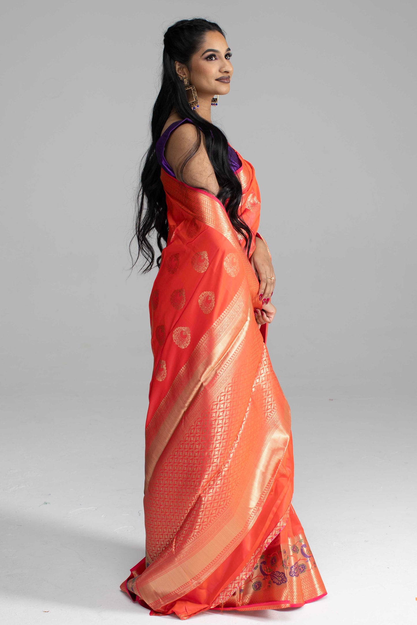 Dual-Shade Peach Saree with Broad Zari Border & Purple Peacock Motif