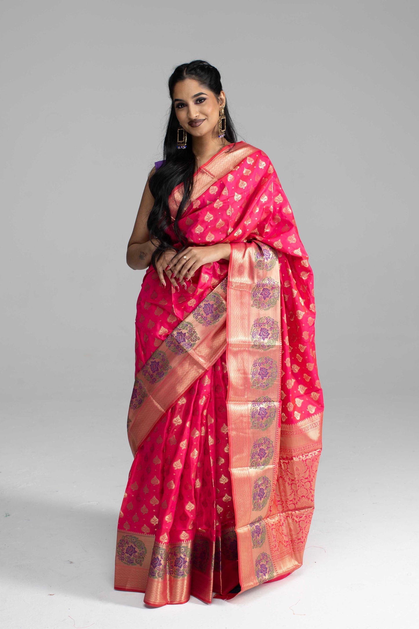 Radiant Pink Silk Saree with Golden Zari Weaving & Floral Motifs