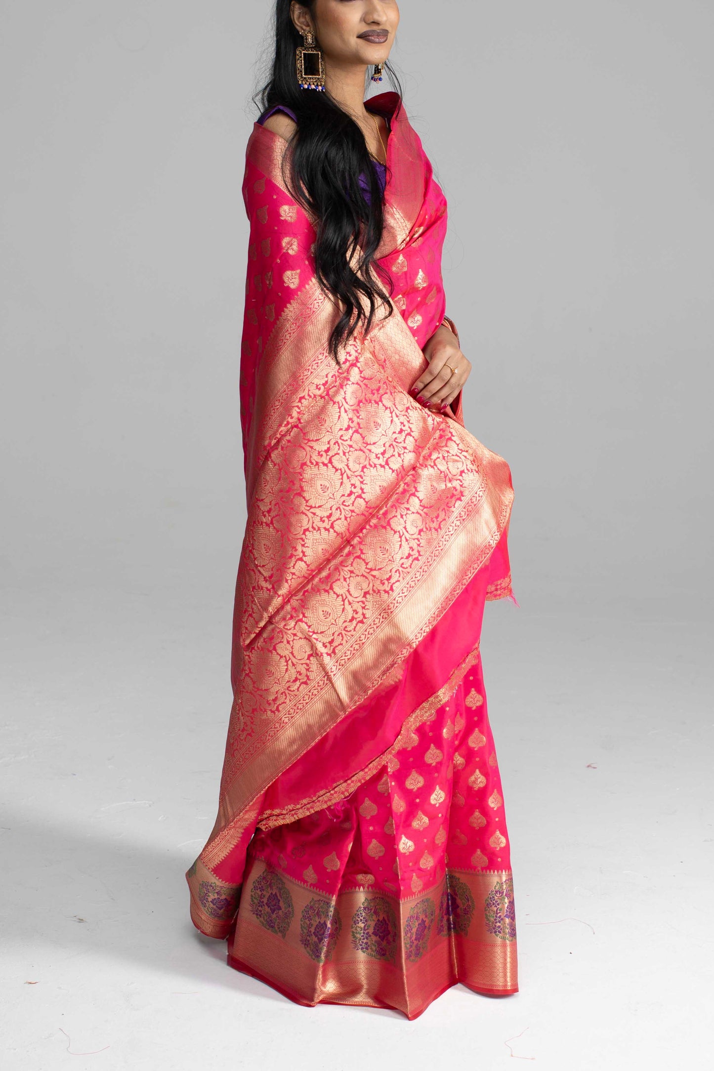 Radiant Pink Silk Saree with Golden Zari Weaving & Floral Motifs