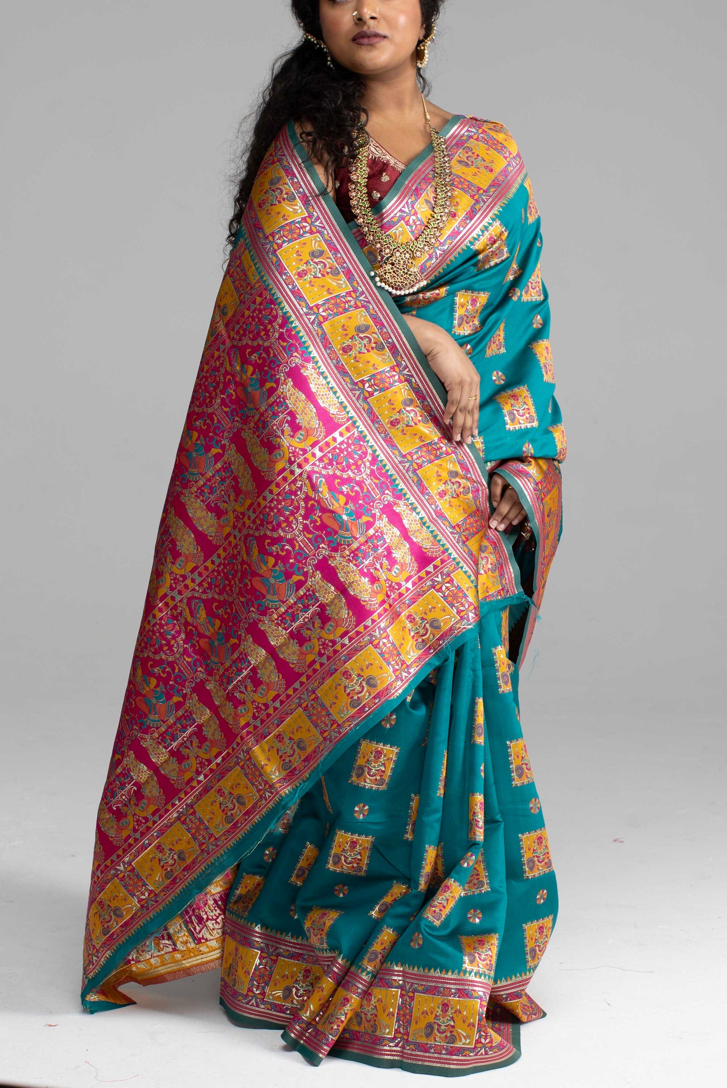 Radiant Teal & Magenta Banarasi Silk Saree with Goddess & temple motifs
