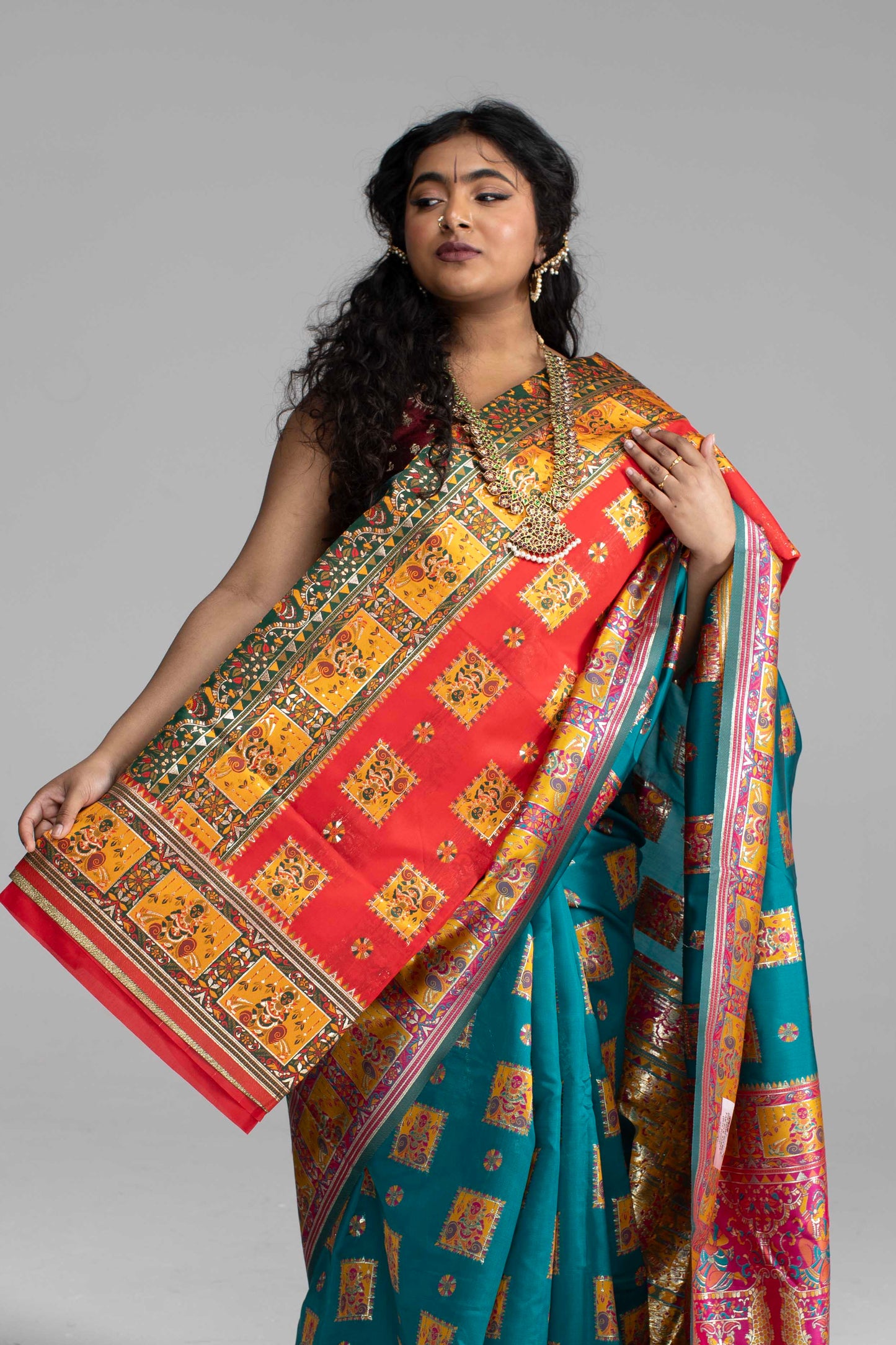 Radiant Teal & Magenta Banarasi Silk Saree with Goddess & temple motifs