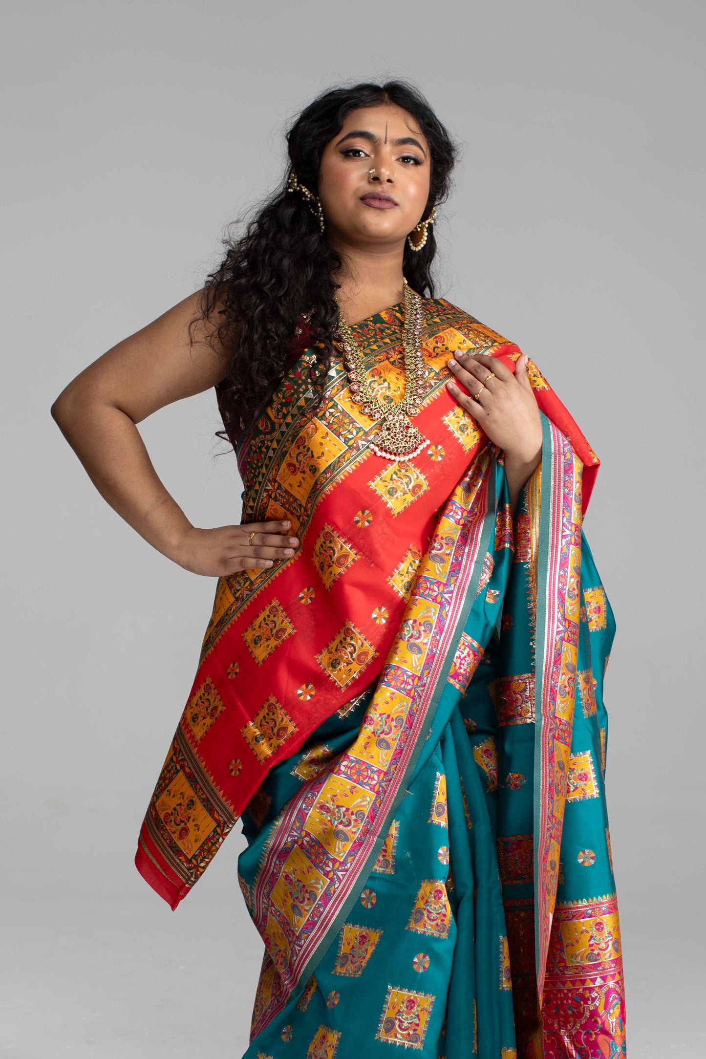 Radiant Teal & Magenta Banarasi Silk Saree with Goddess & temple motifs