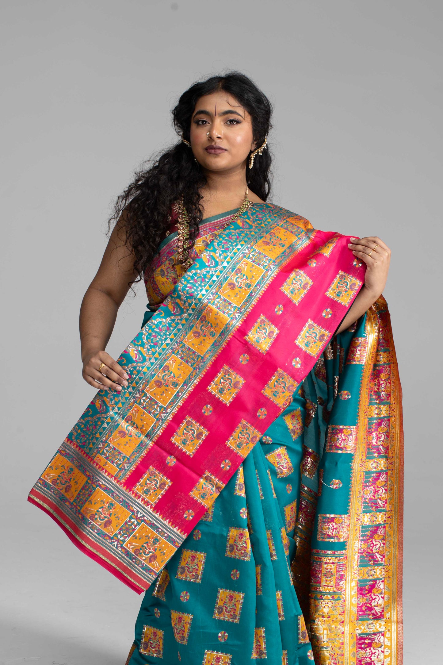 Radiant Teal & Magenta Banarasi Silk Saree with Goddess & temple motifs
