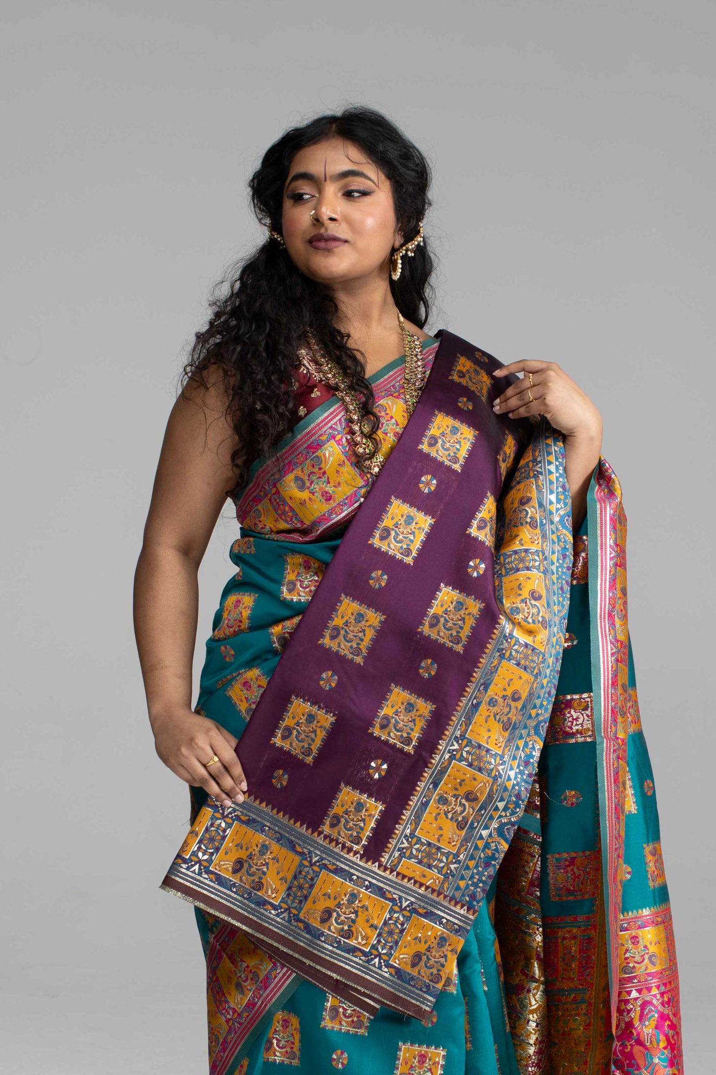Radiant Teal & Magenta Banarasi Silk Saree with Goddess & temple motifs