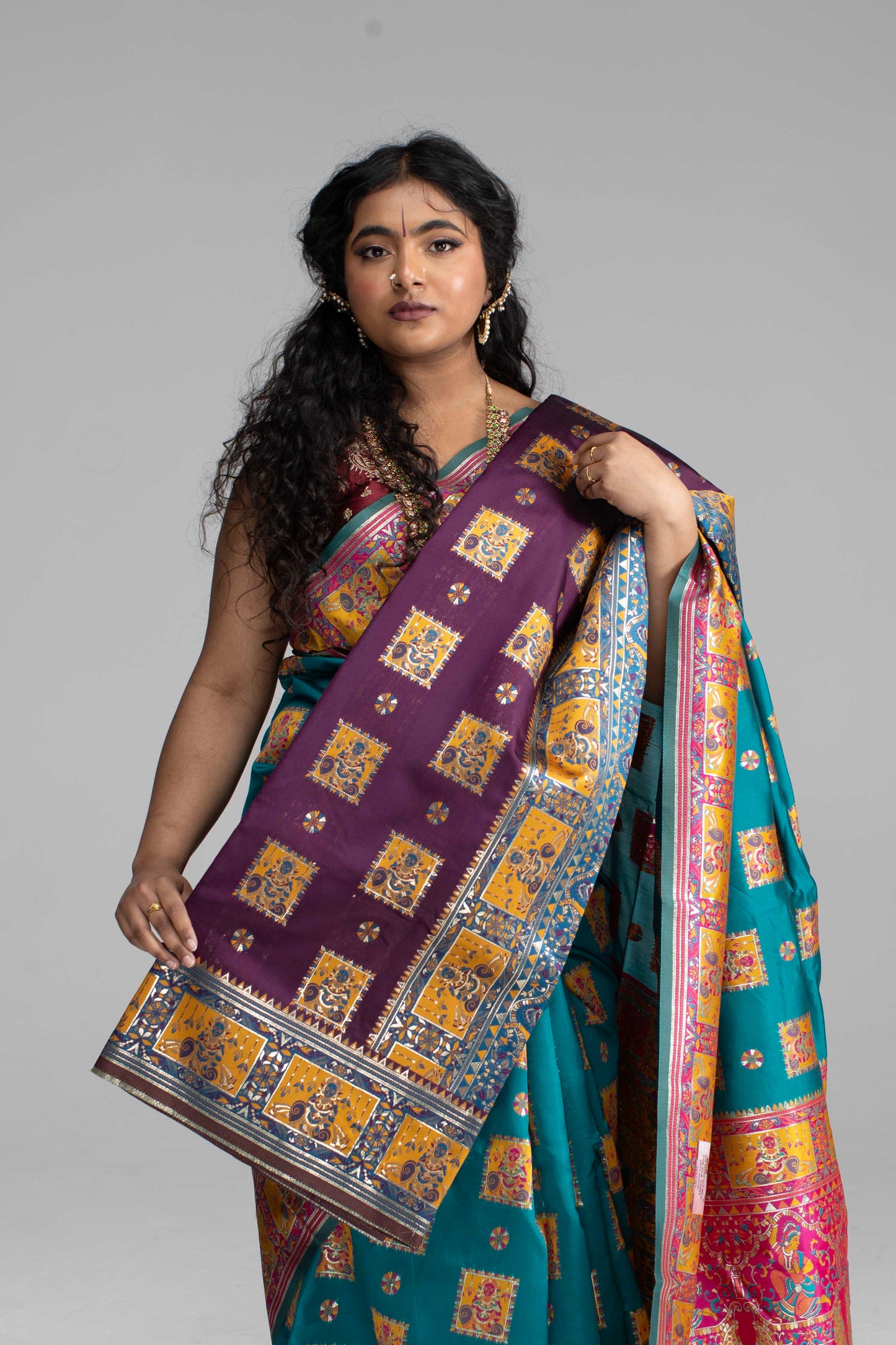 Radiant Teal & Magenta Banarasi Silk Saree with Goddess & temple motifs
