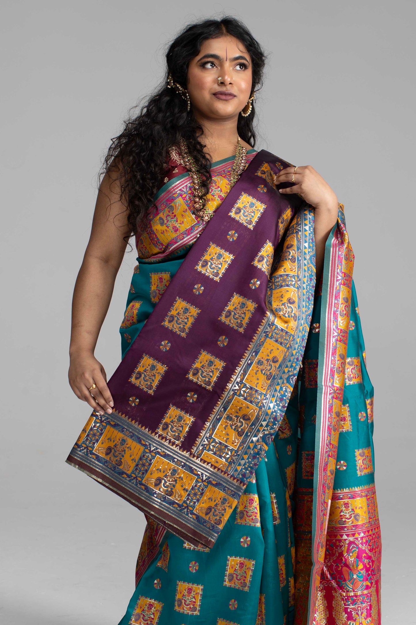 Radiant Teal & Magenta Banarasi Silk Saree with Goddess & temple motifs