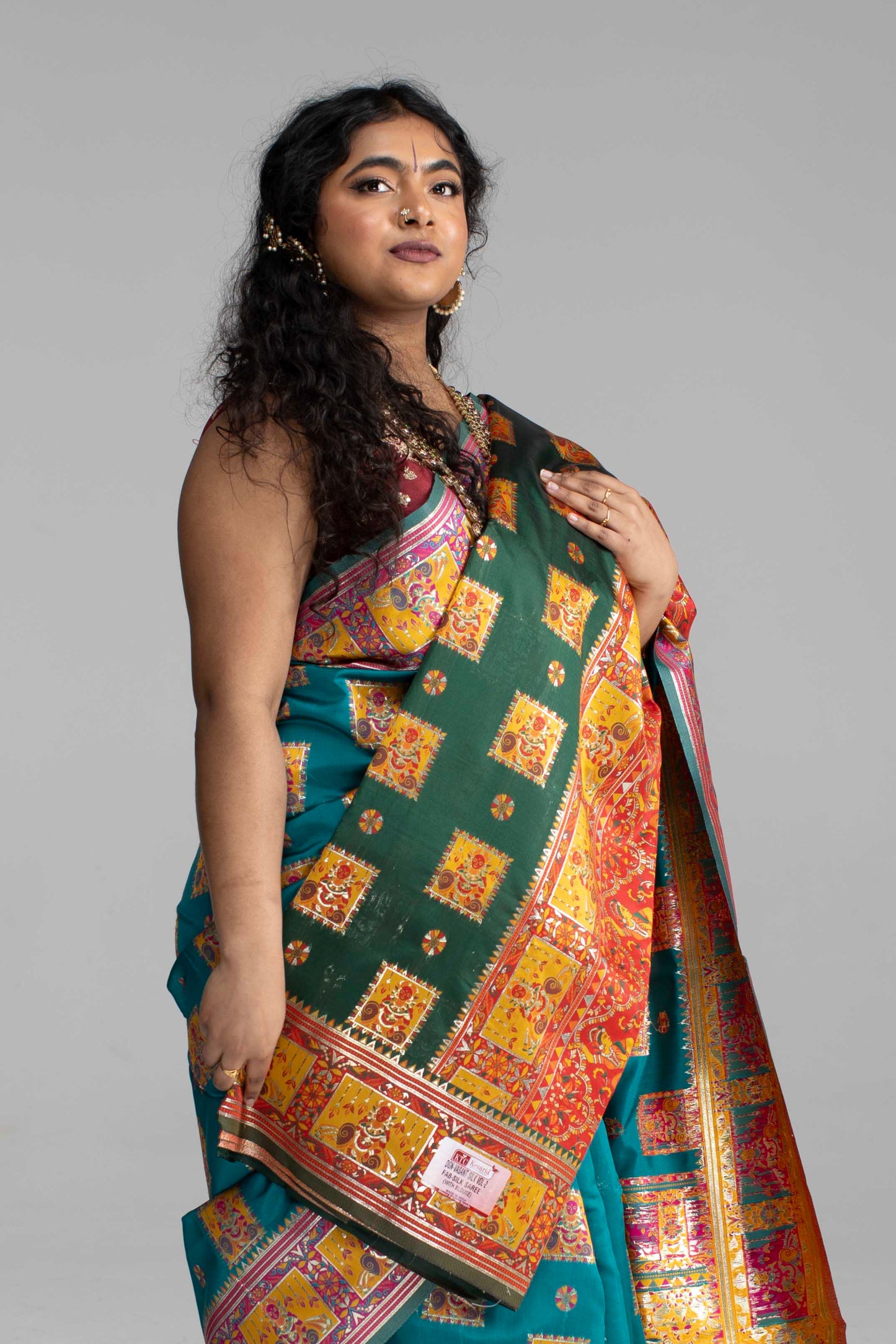 Radiant Teal & Magenta Banarasi Silk Saree with Goddess & temple motifs