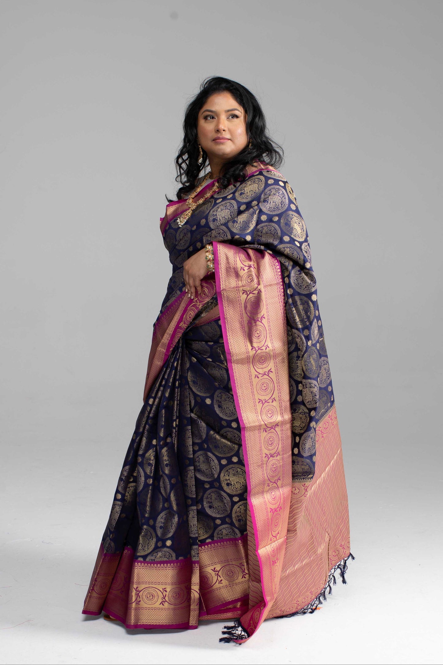 Dark Blue Saree with Gold Butta Motifs and Pink Border