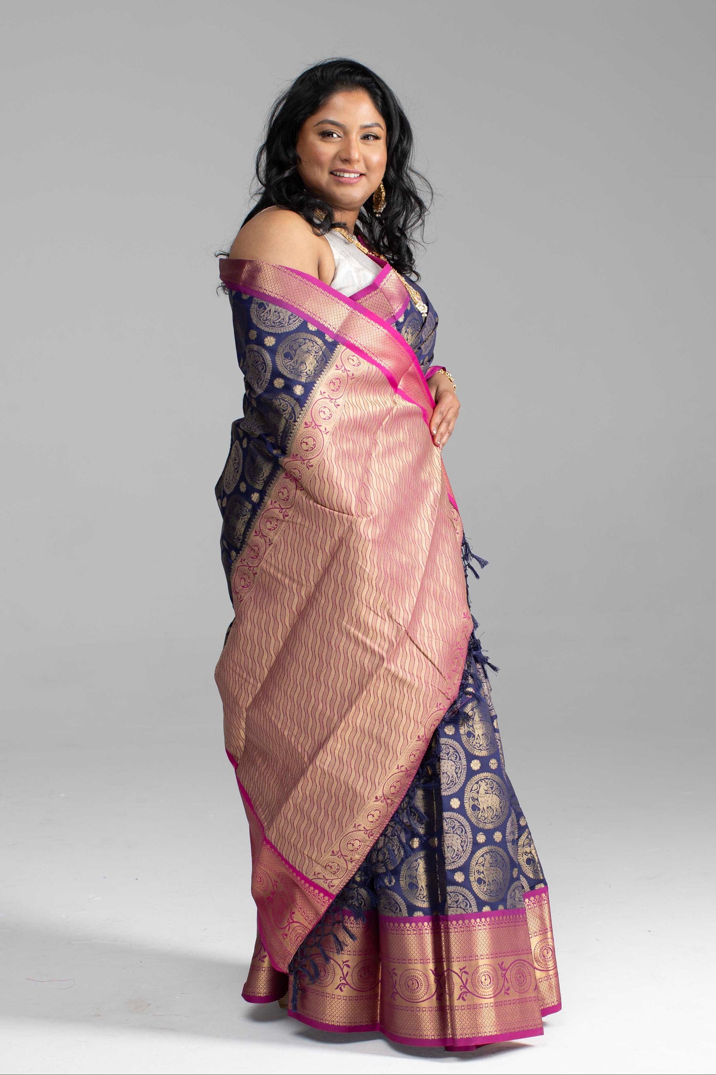 Dark Blue Saree with Gold Butta Motifs and Pink Border