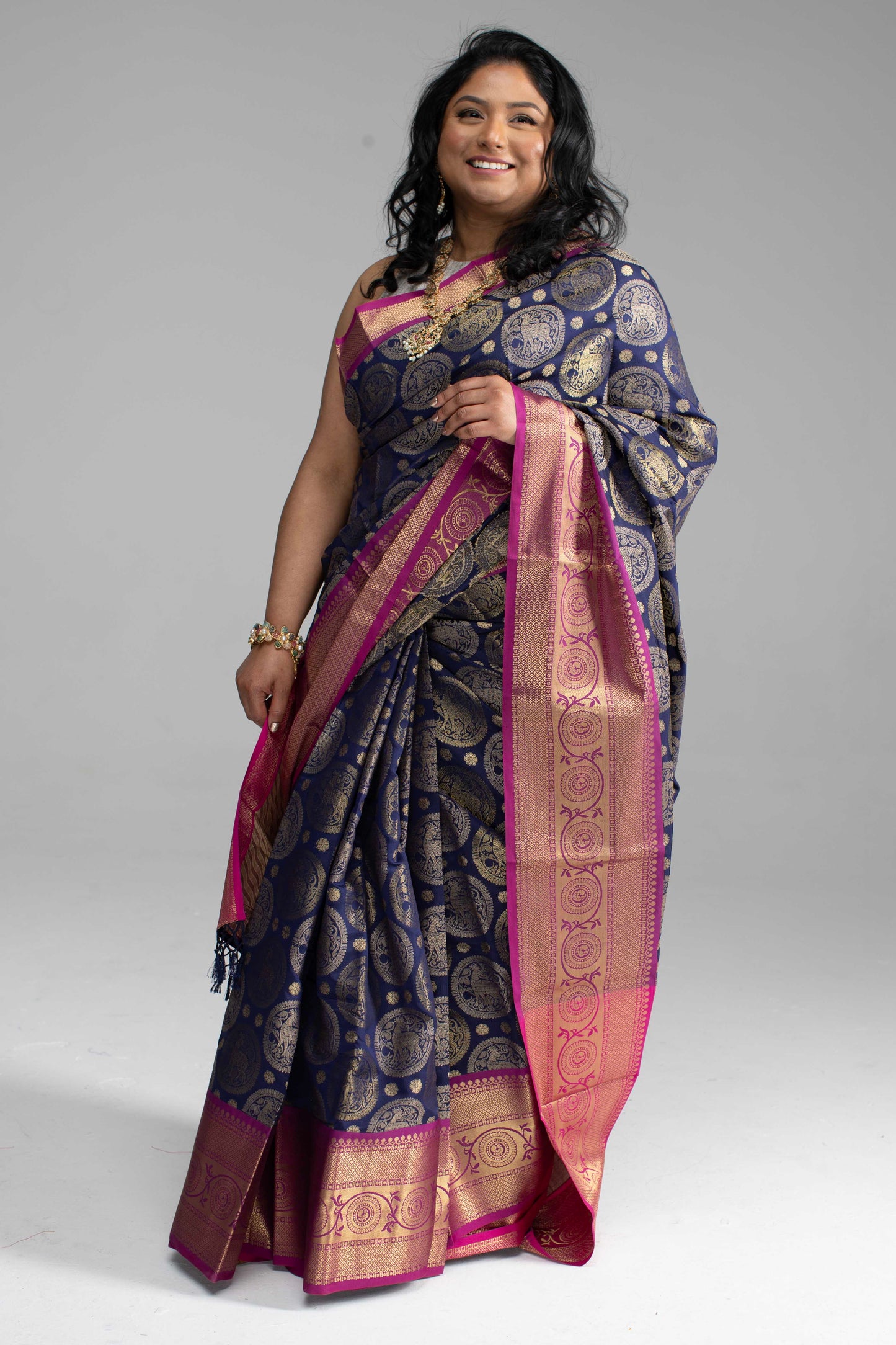 Dark Blue Saree with Gold Butta Motifs and Pink Border