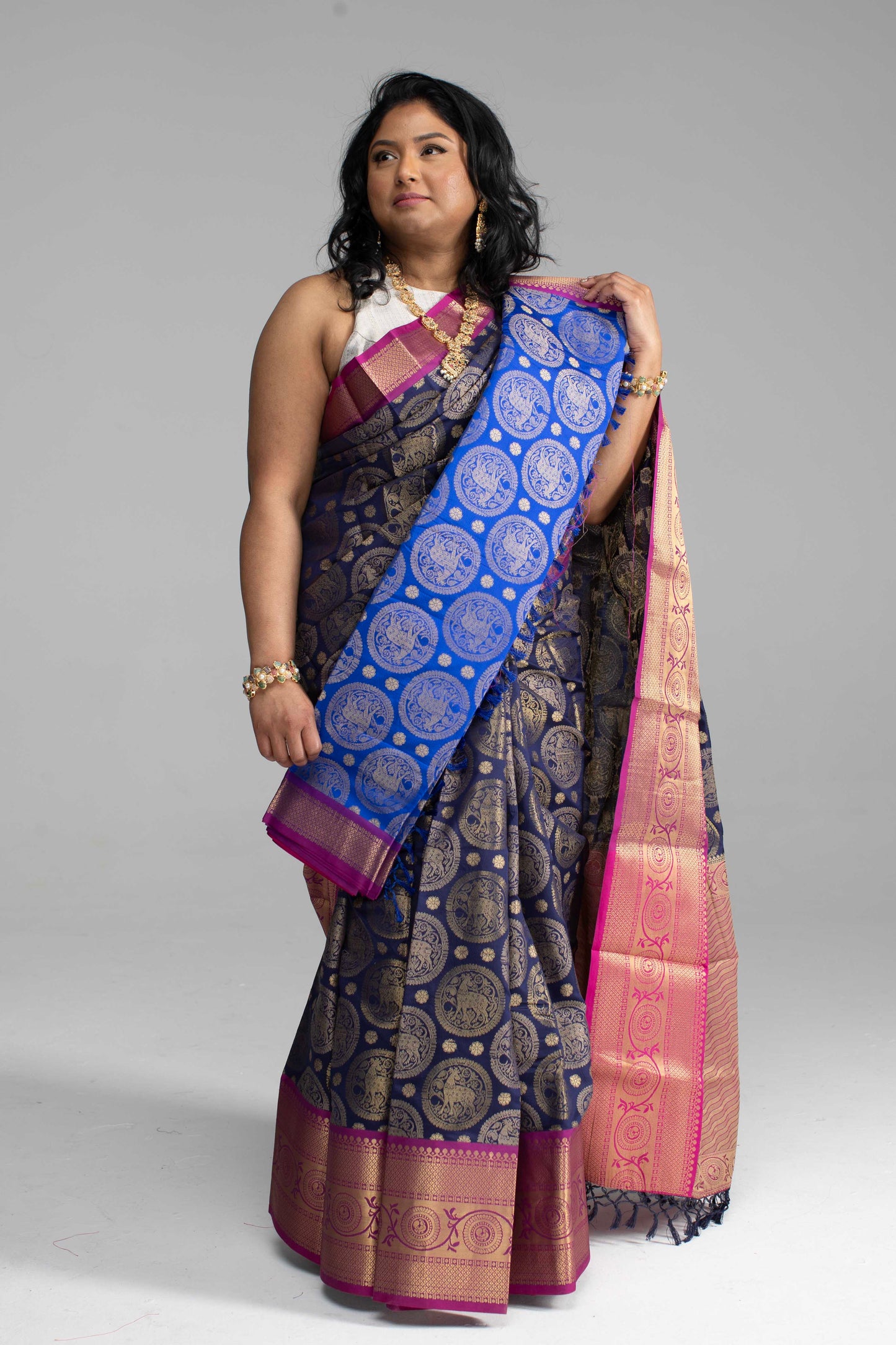 Dark Blue Saree with Gold Butta Motifs and Pink Border