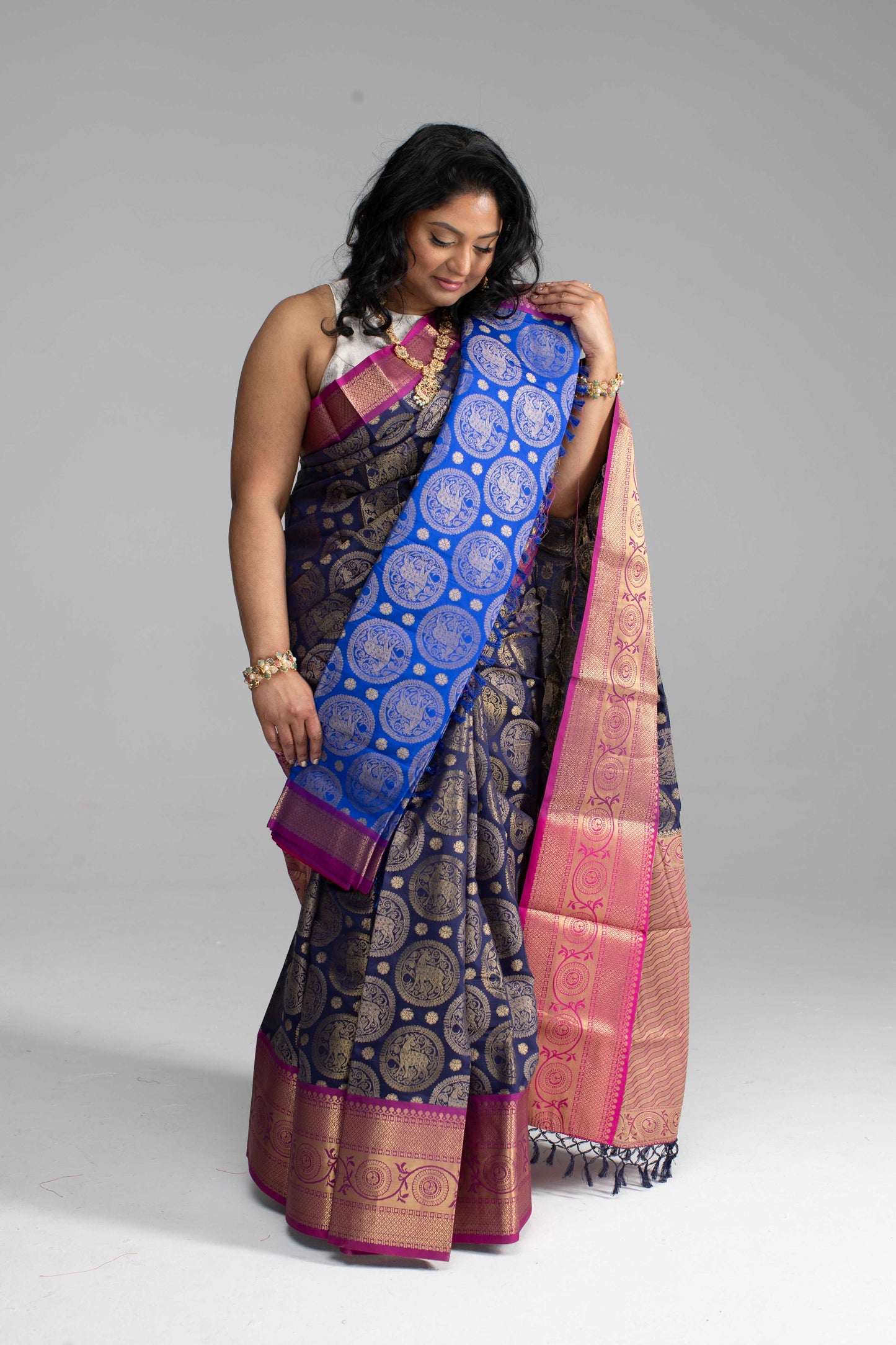 Dark Blue Saree with Gold Butta Motifs and Pink Border
