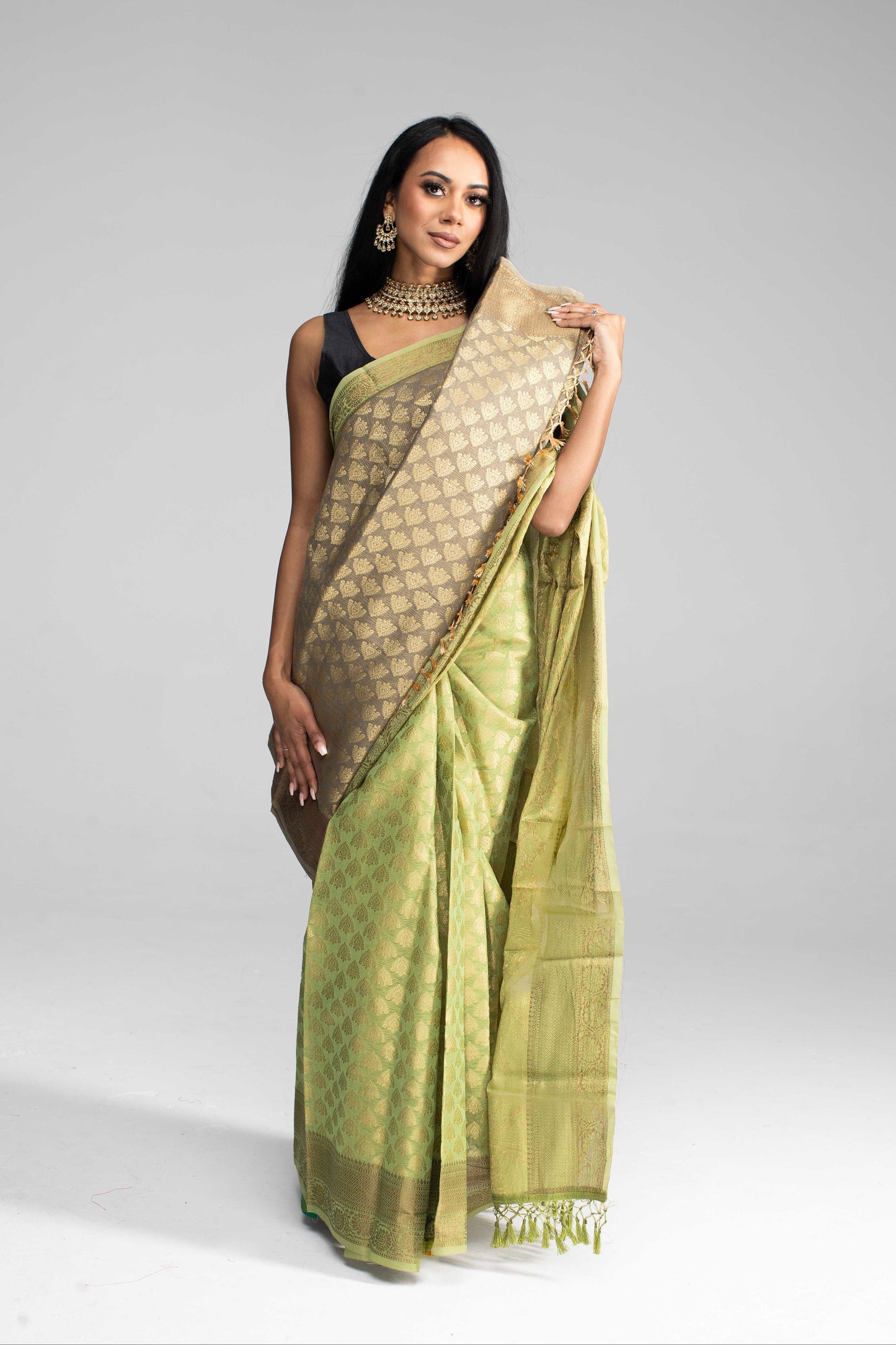 Olive Green Silk Saree Adorned in All-Over Gold Work