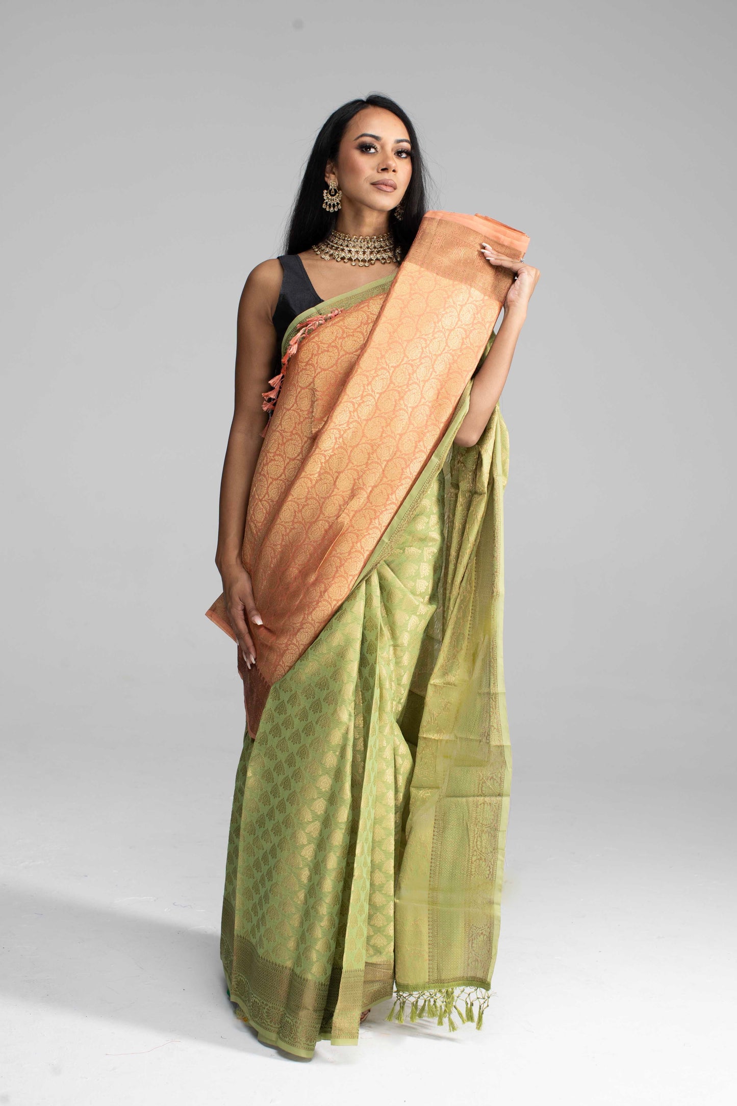 Olive Green Silk Saree Adorned in All-Over Gold Work