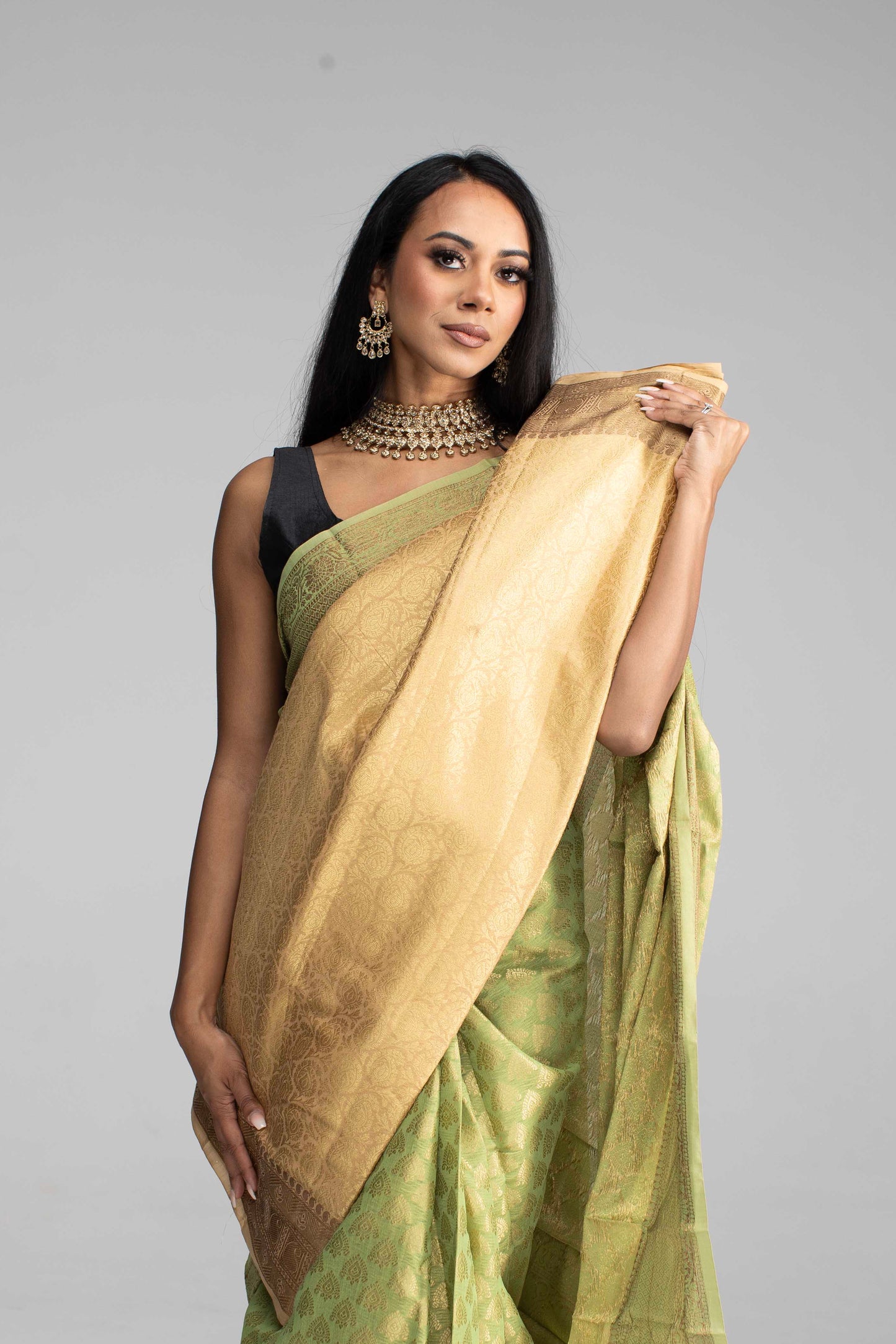 Olive Green Silk Saree Adorned in All-Over Gold Work