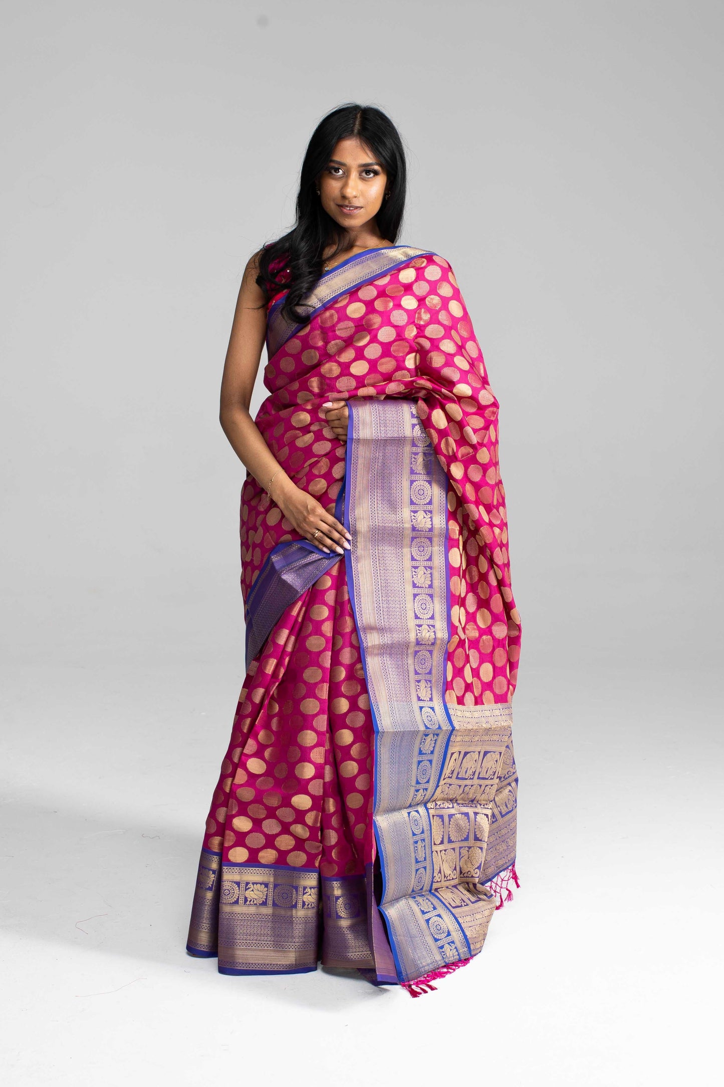Magenta Saree with Blue Border and Statement Round Buttas
