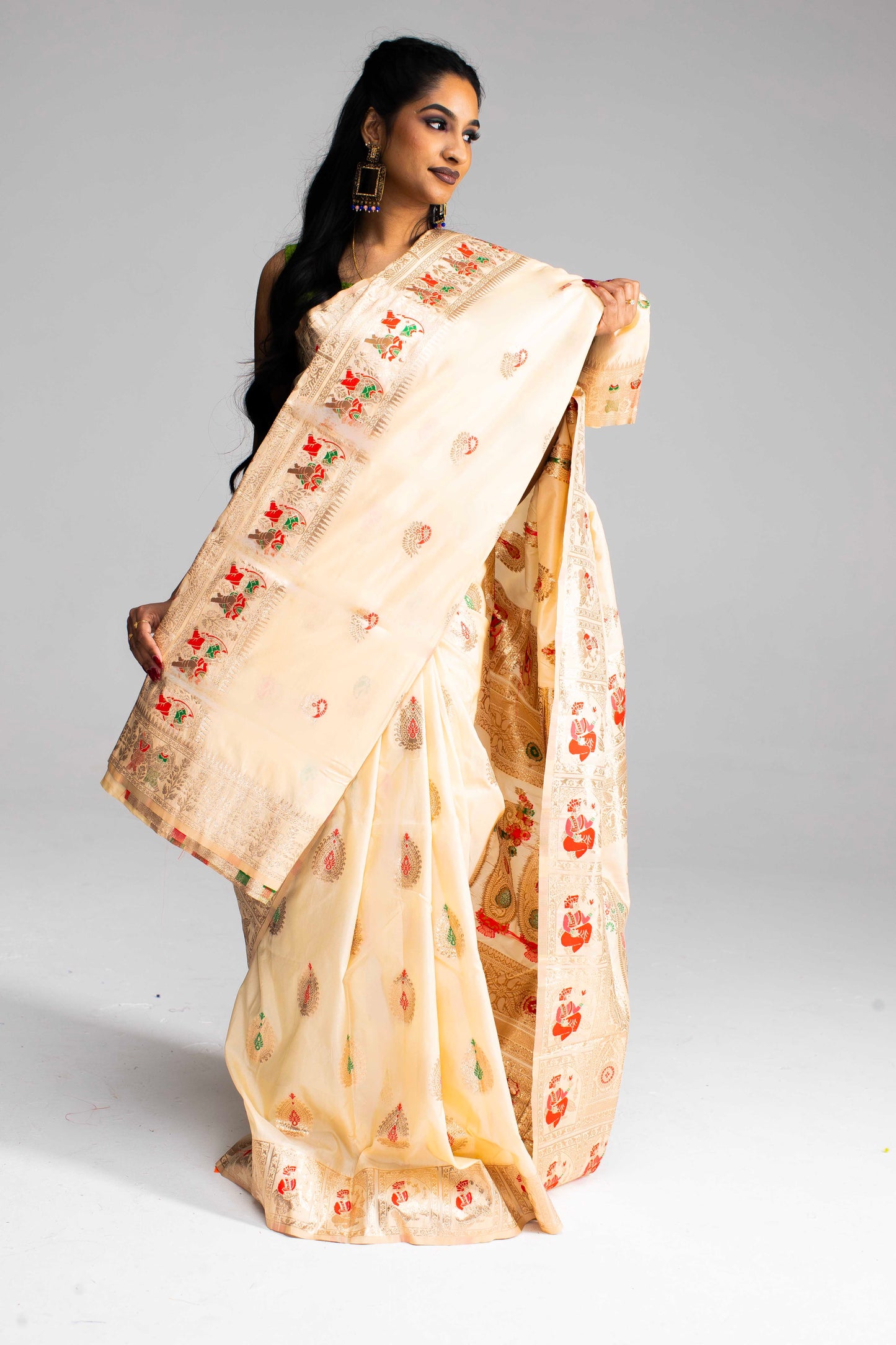 Graceful Cream Silk Saree with Gold Motif Work