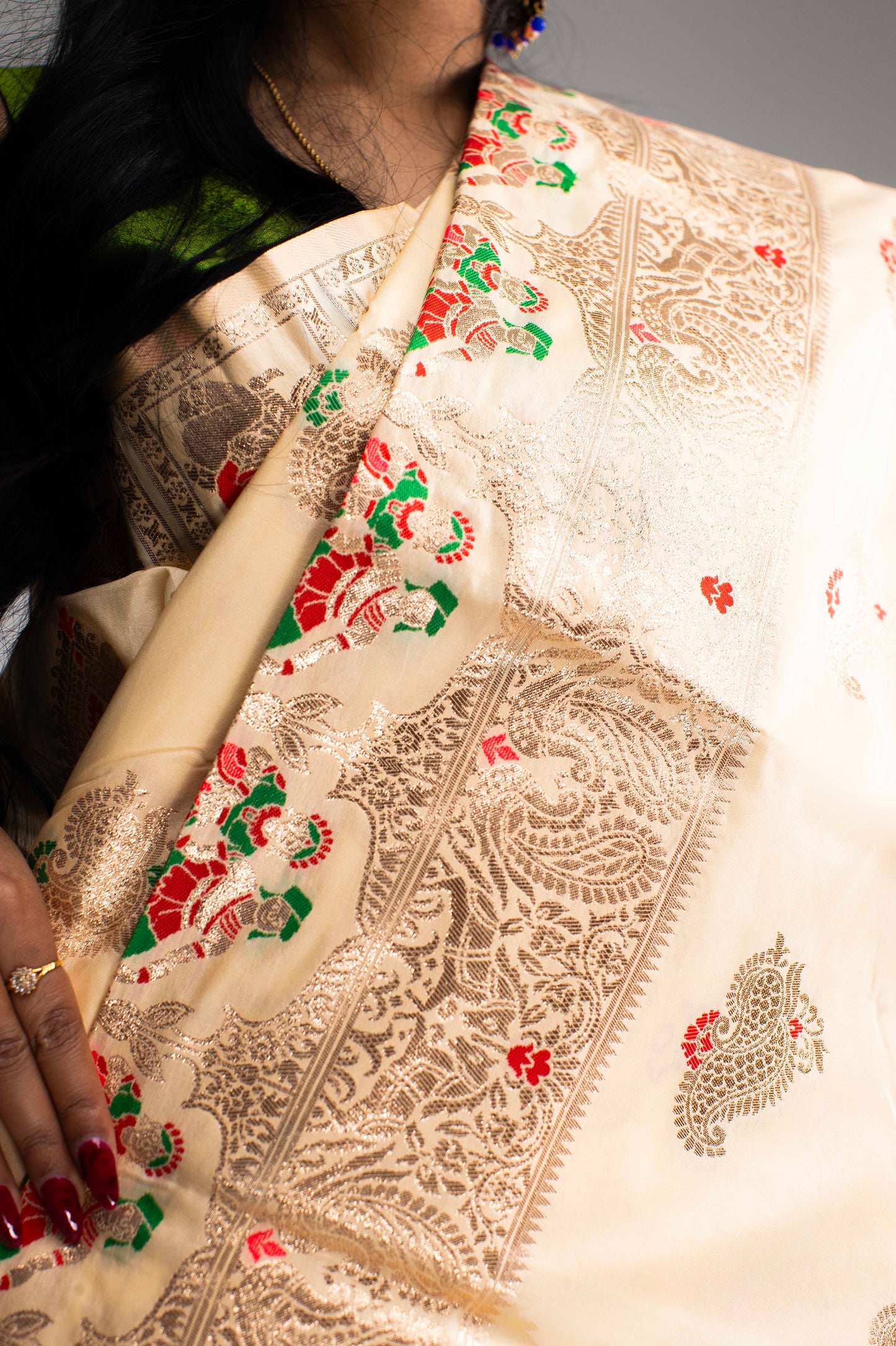 Graceful Cream Silk Saree with Gold Motif Work
