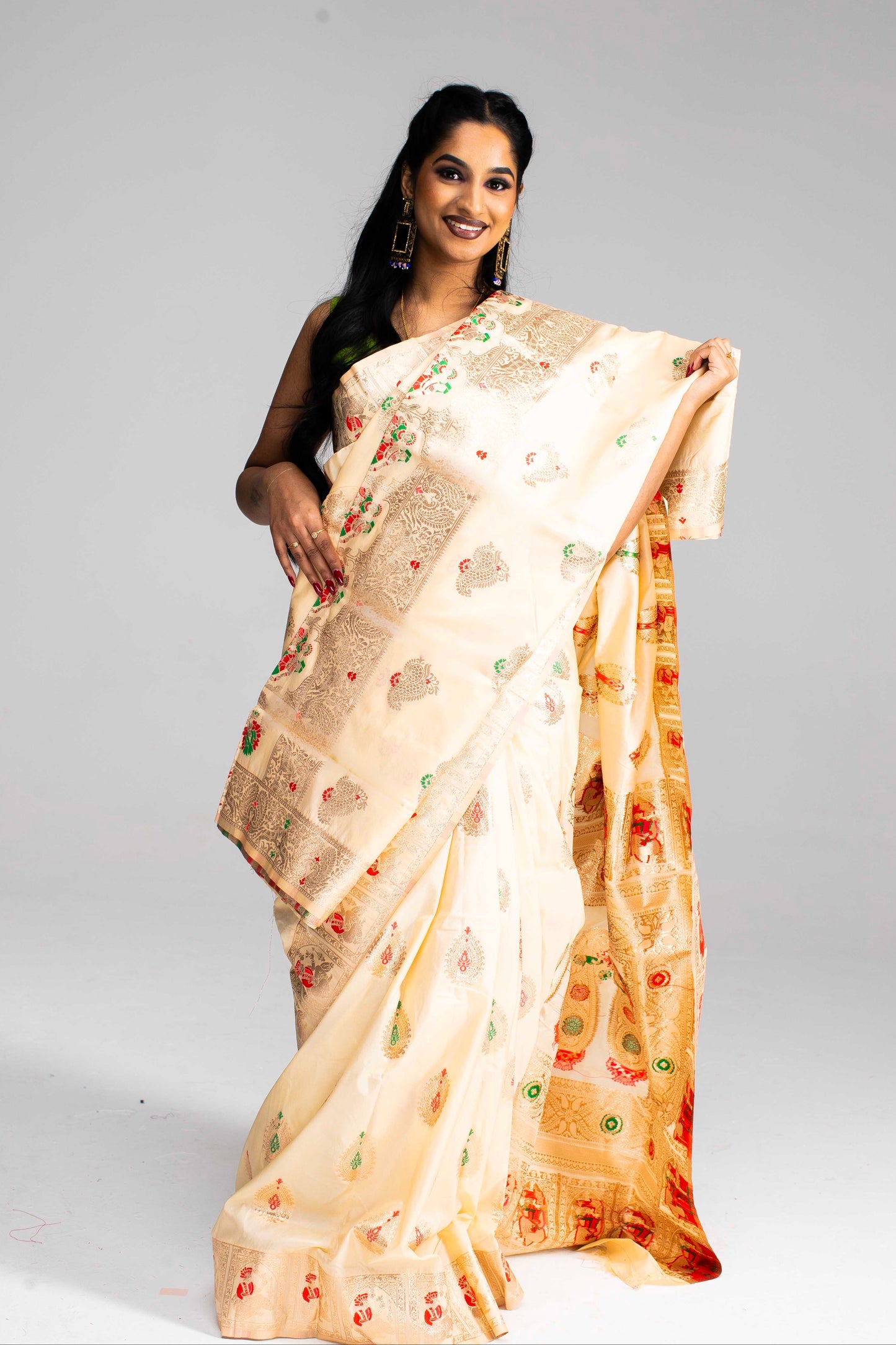 Graceful Cream Silk Saree with Gold Motif Work