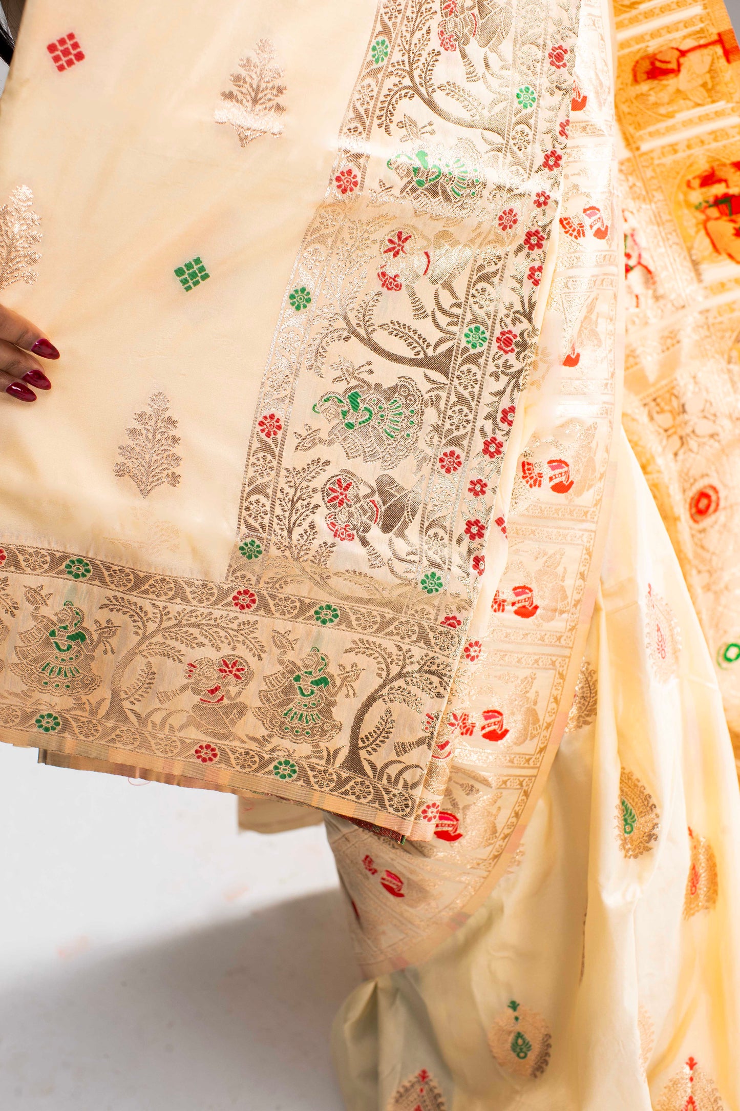 Graceful Cream Silk Saree with Gold Motif Work