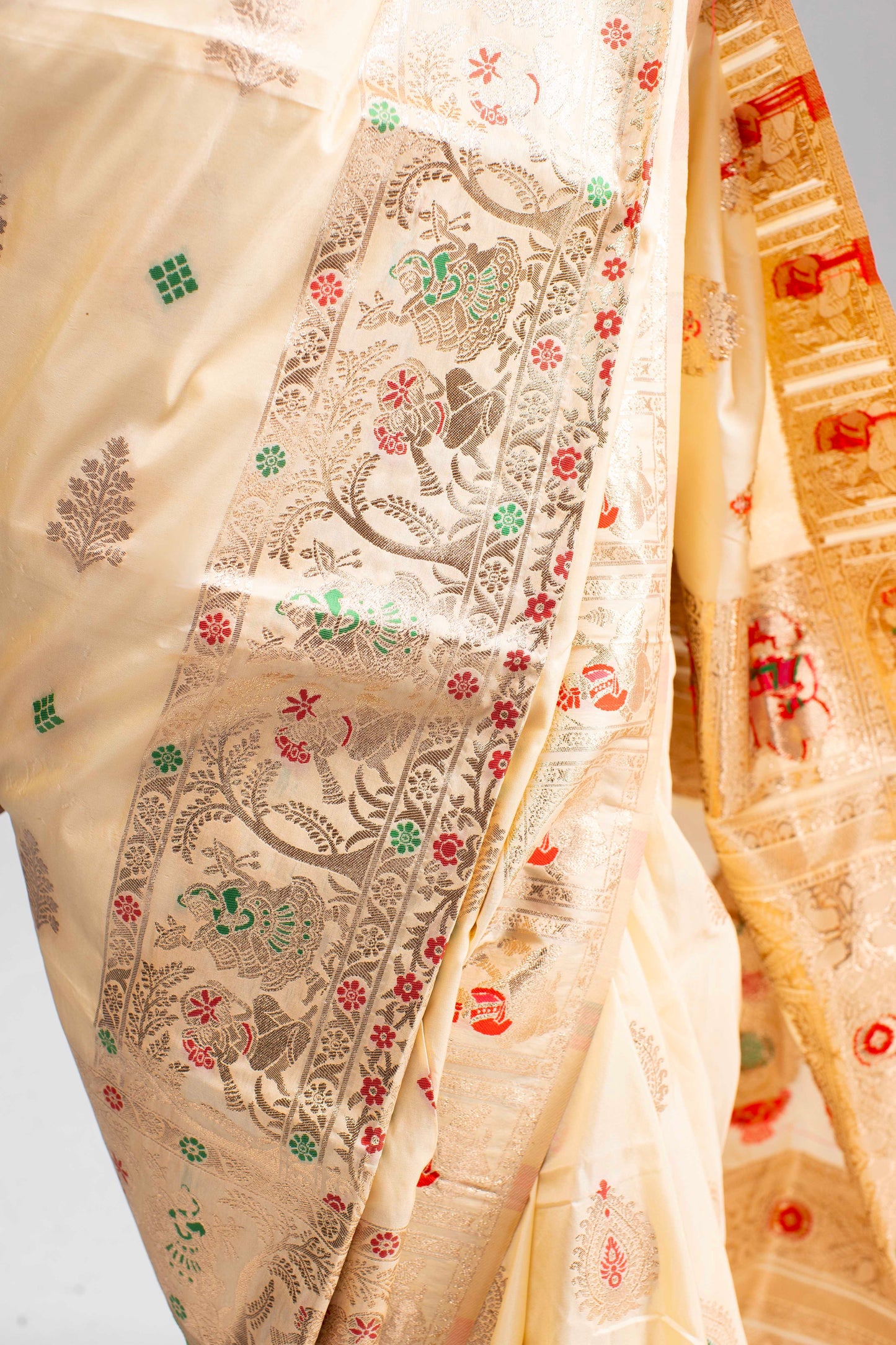 Graceful Cream Silk Saree with Gold Motif Work