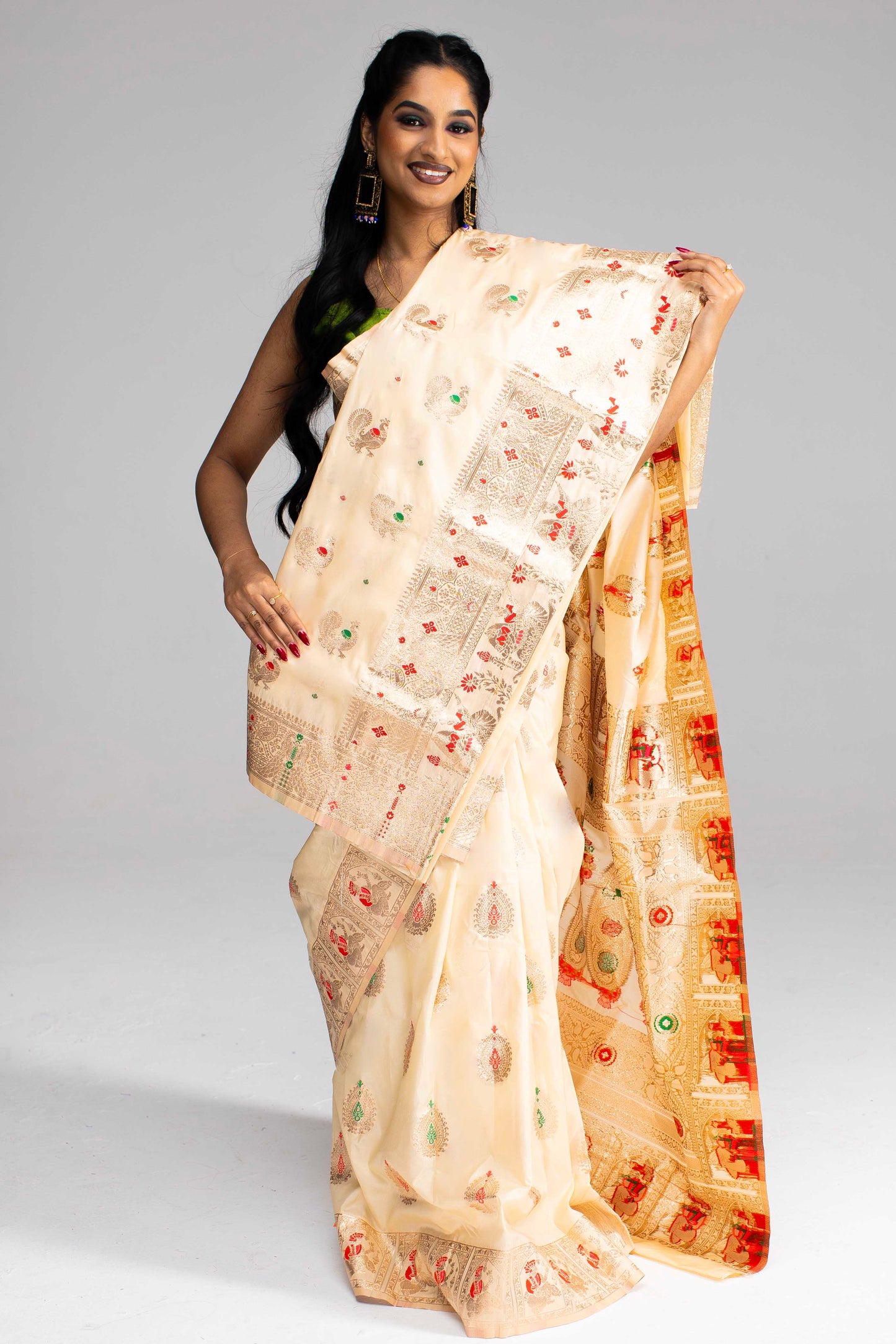 Graceful Cream Silk Saree with Gold Motif Work