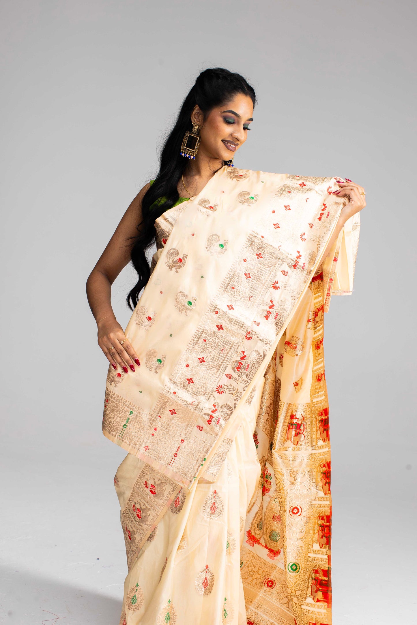 Graceful Cream Silk Saree with Gold Motif Work