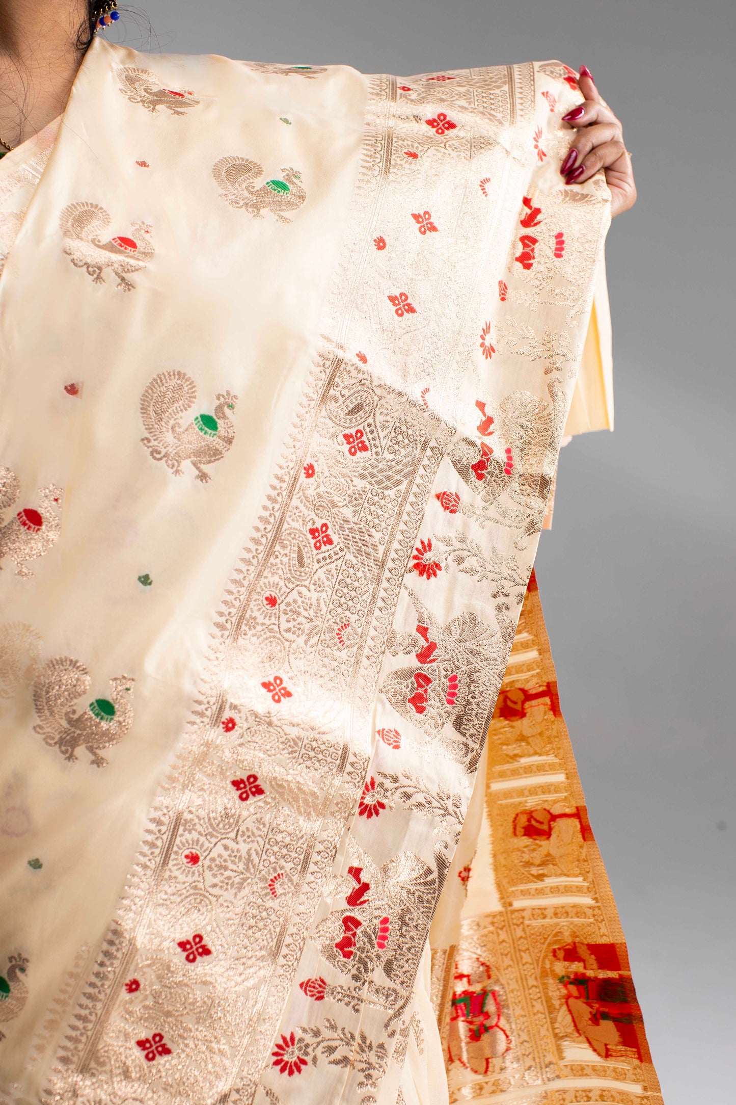 Graceful Cream Silk Saree with Gold Motif Work