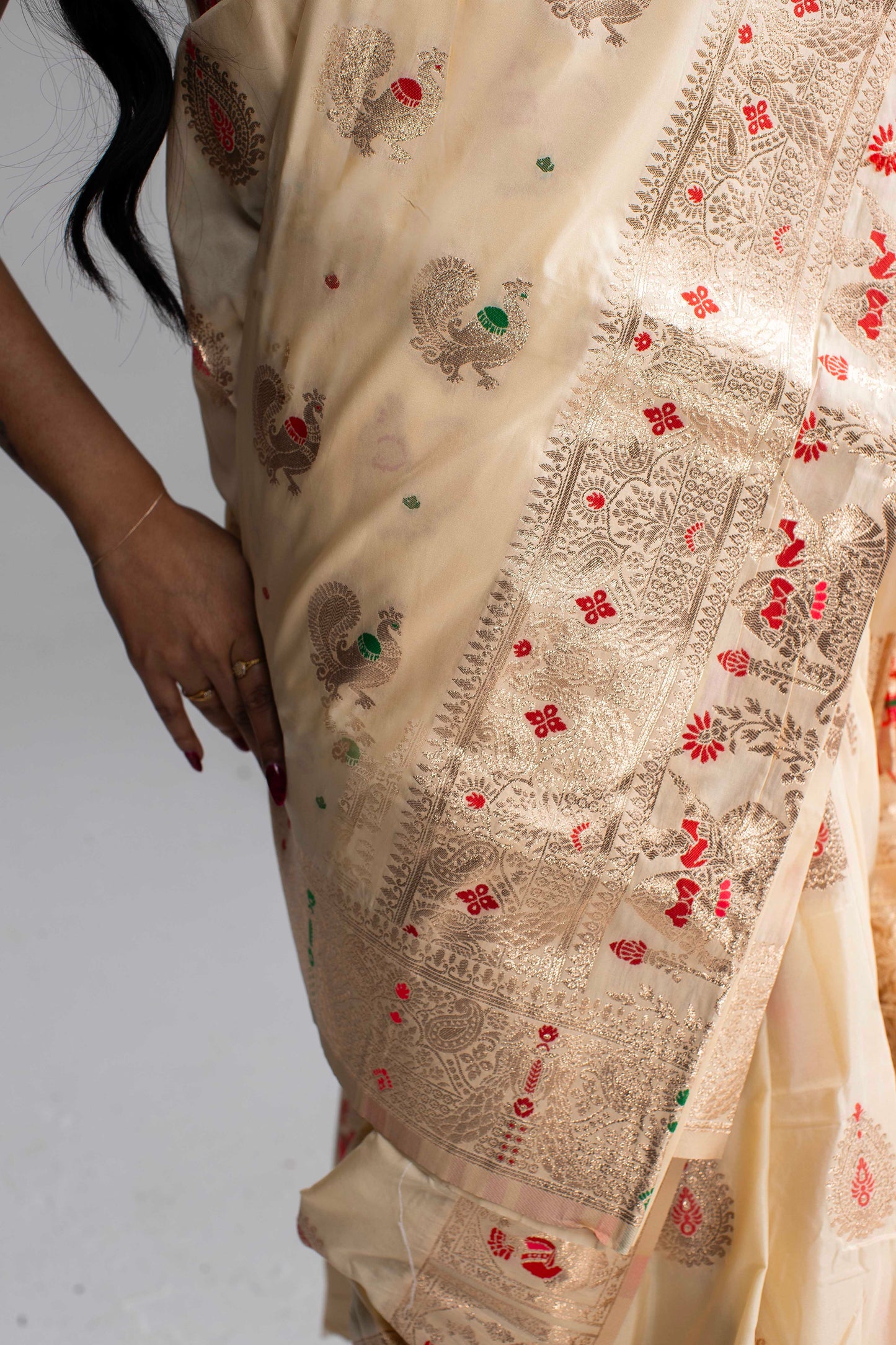 Graceful Cream Silk Saree with Gold Motif Work