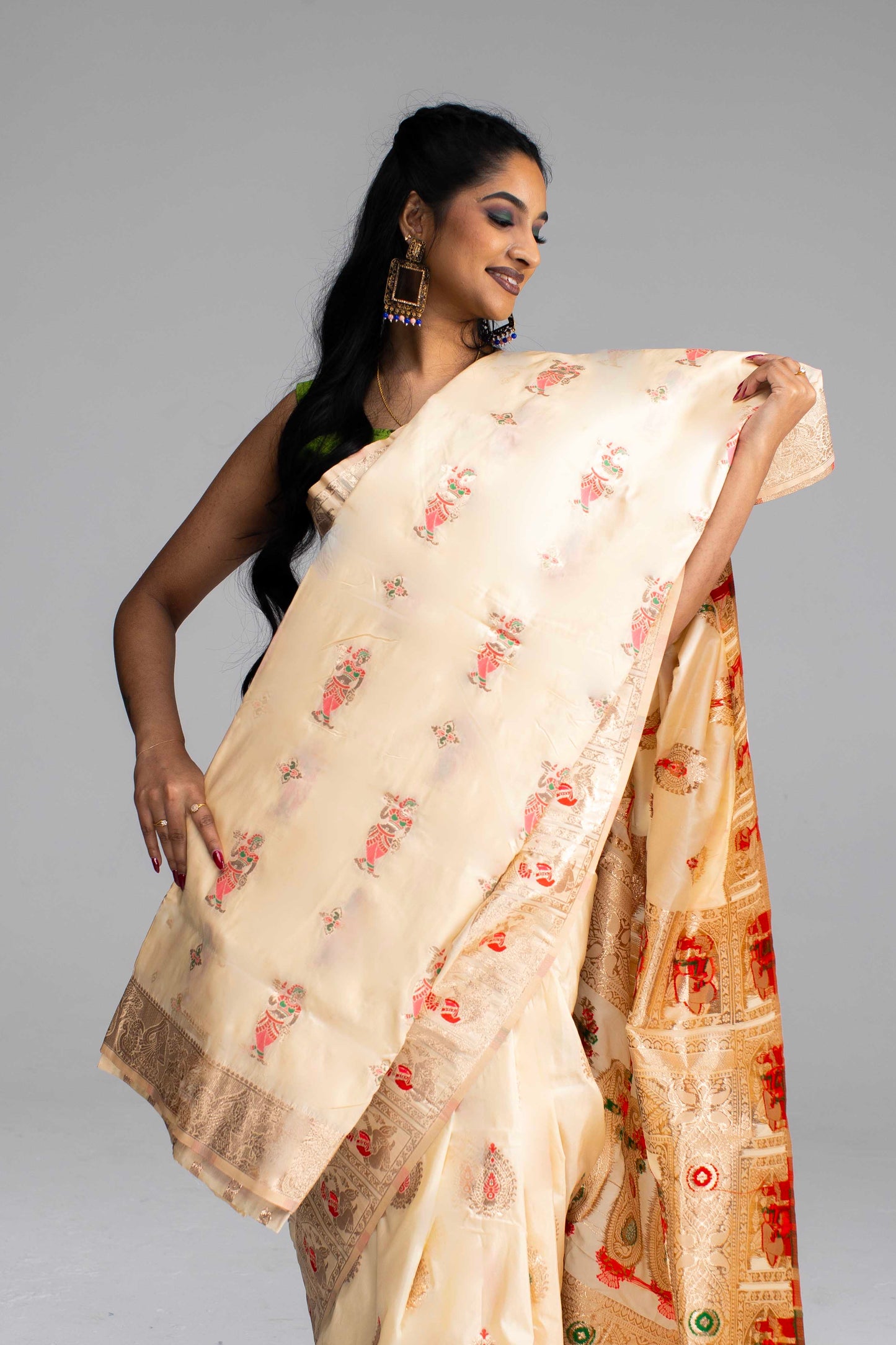 Graceful Cream Silk Saree with Gold Motif Work