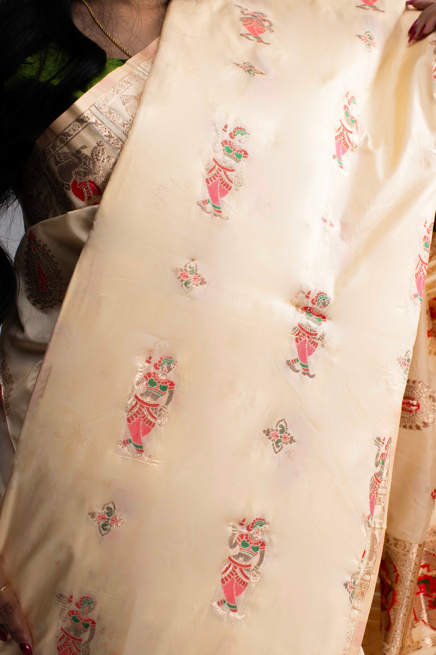 Graceful Cream Silk Saree with Gold Motif Work