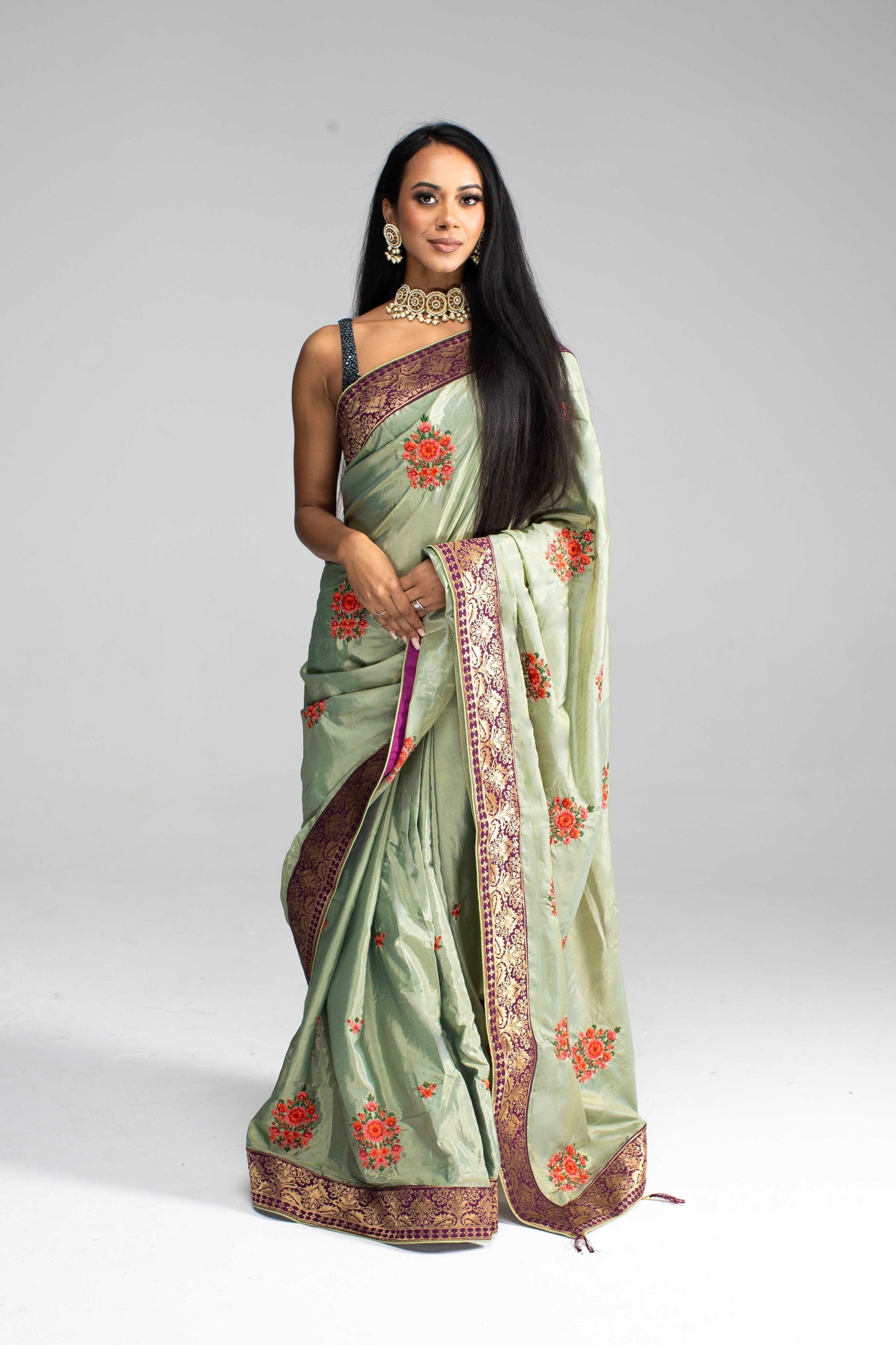 Luxurious Olive Green saree with Floral Embroidery and Contrast Border